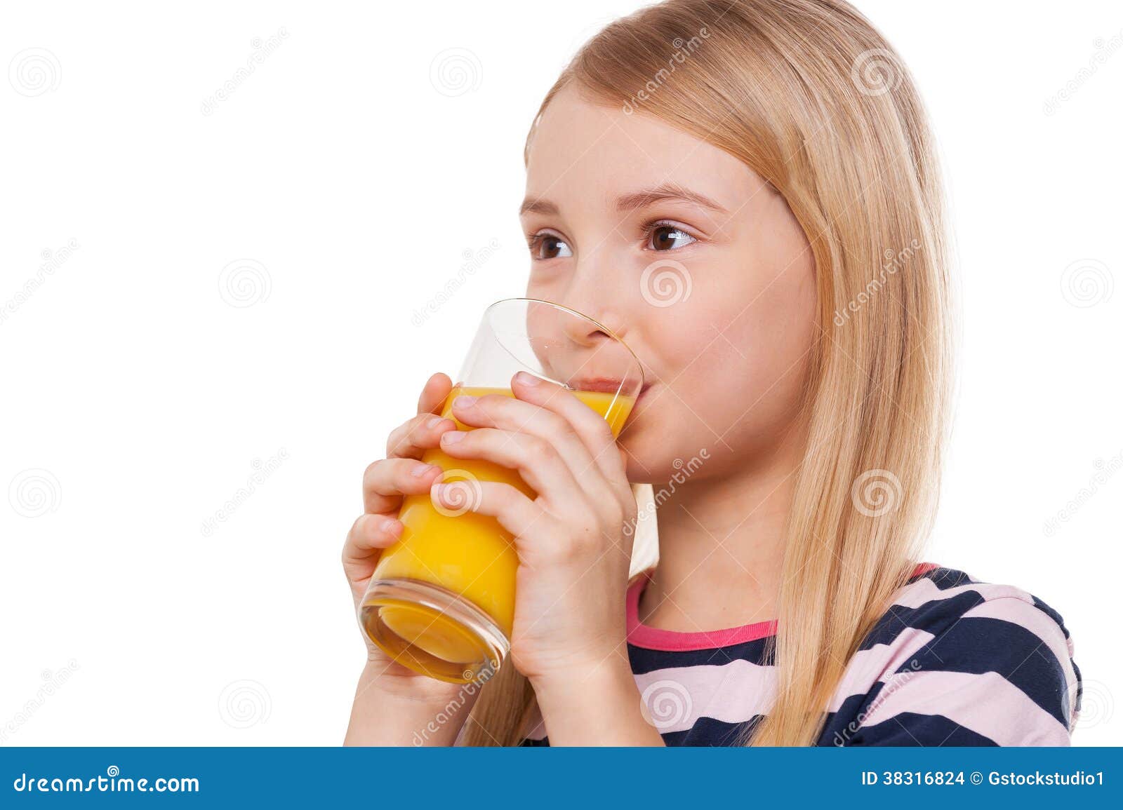 Drinking orange juice. stock photo. Image of innocence 38316824