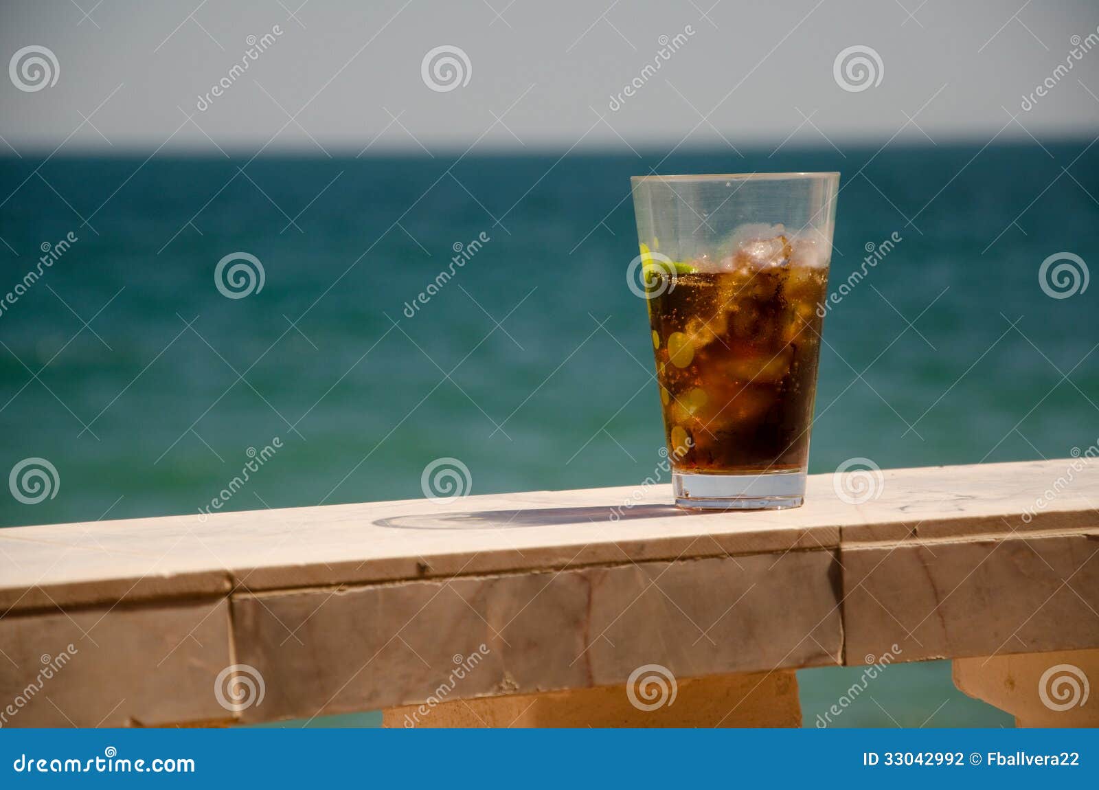 Drinking by the sea stock photo. Image of glass, waves 33042992