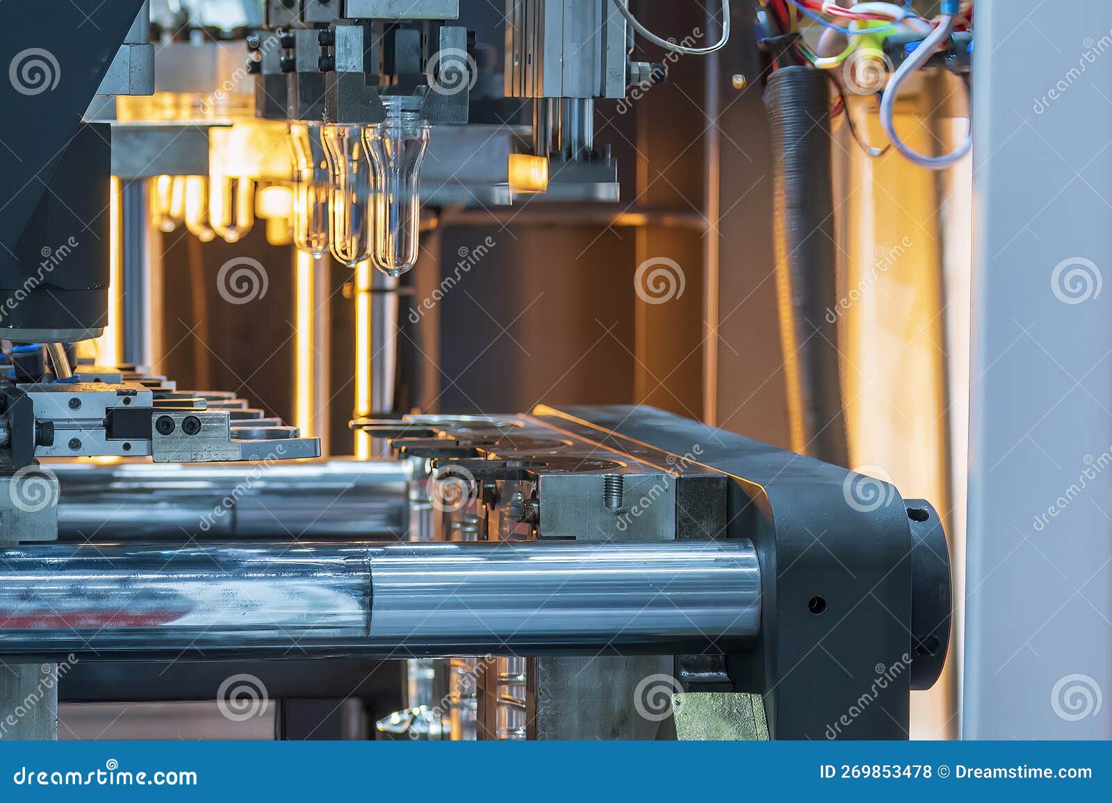 The Drinking Water Bottle Manufacturing Process by Blow Mold Machine Stock Photo Image of
