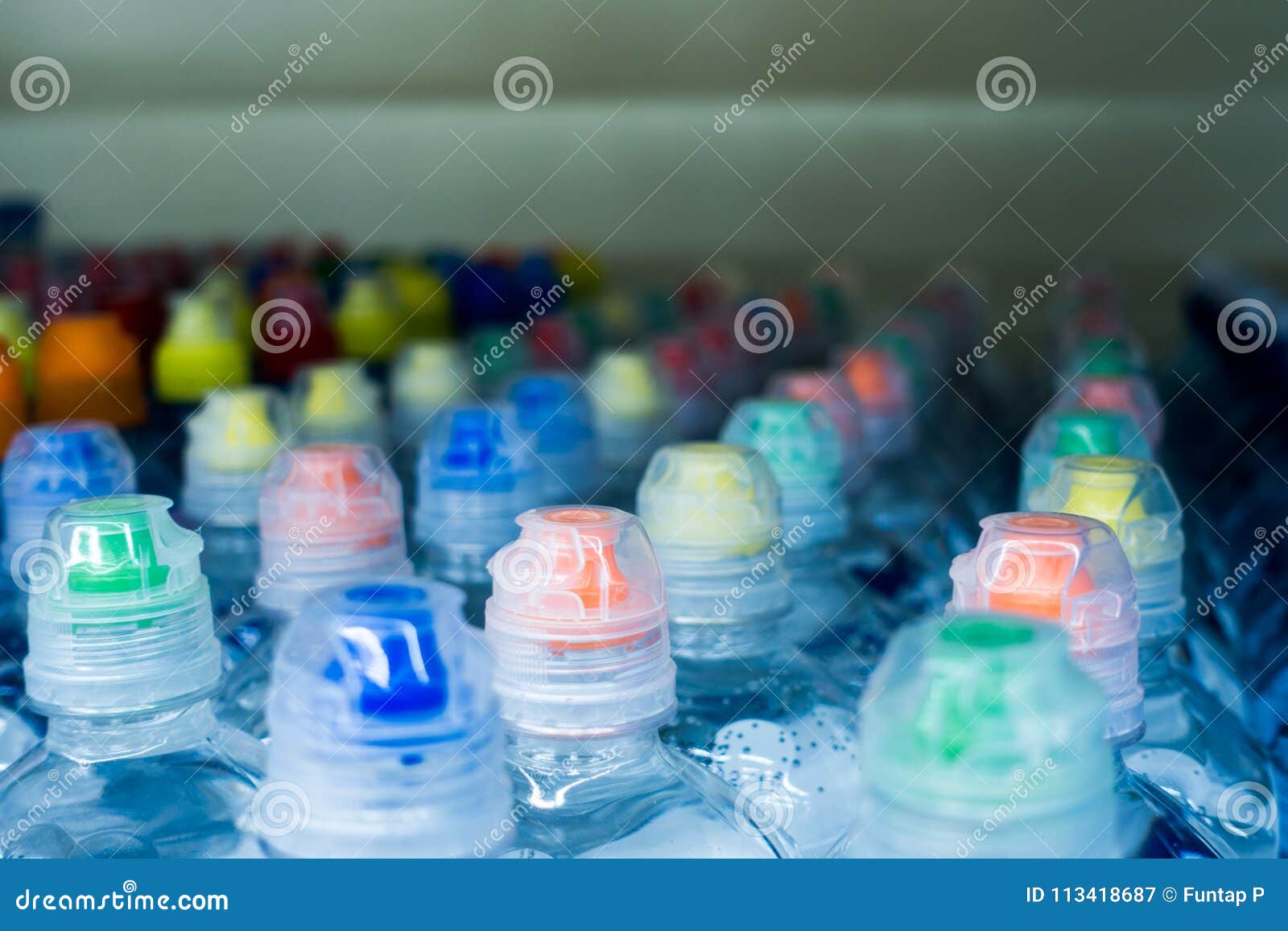 Drinking Water, Multicolored Plastic Cap. Bottle Caps on the Market