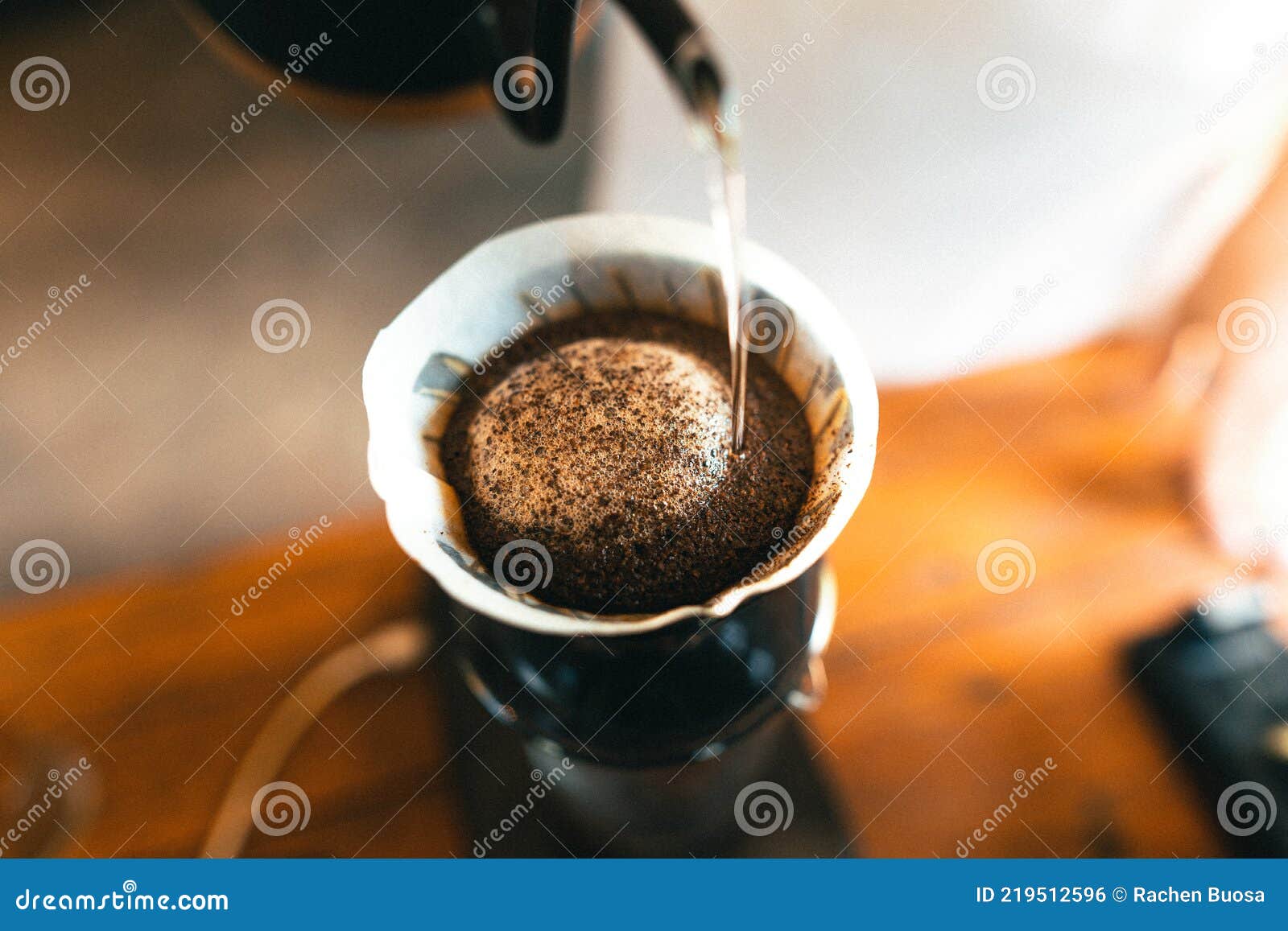 Drip Coffee, Barista Pouring Water on Coffee Ground with Filter Stock