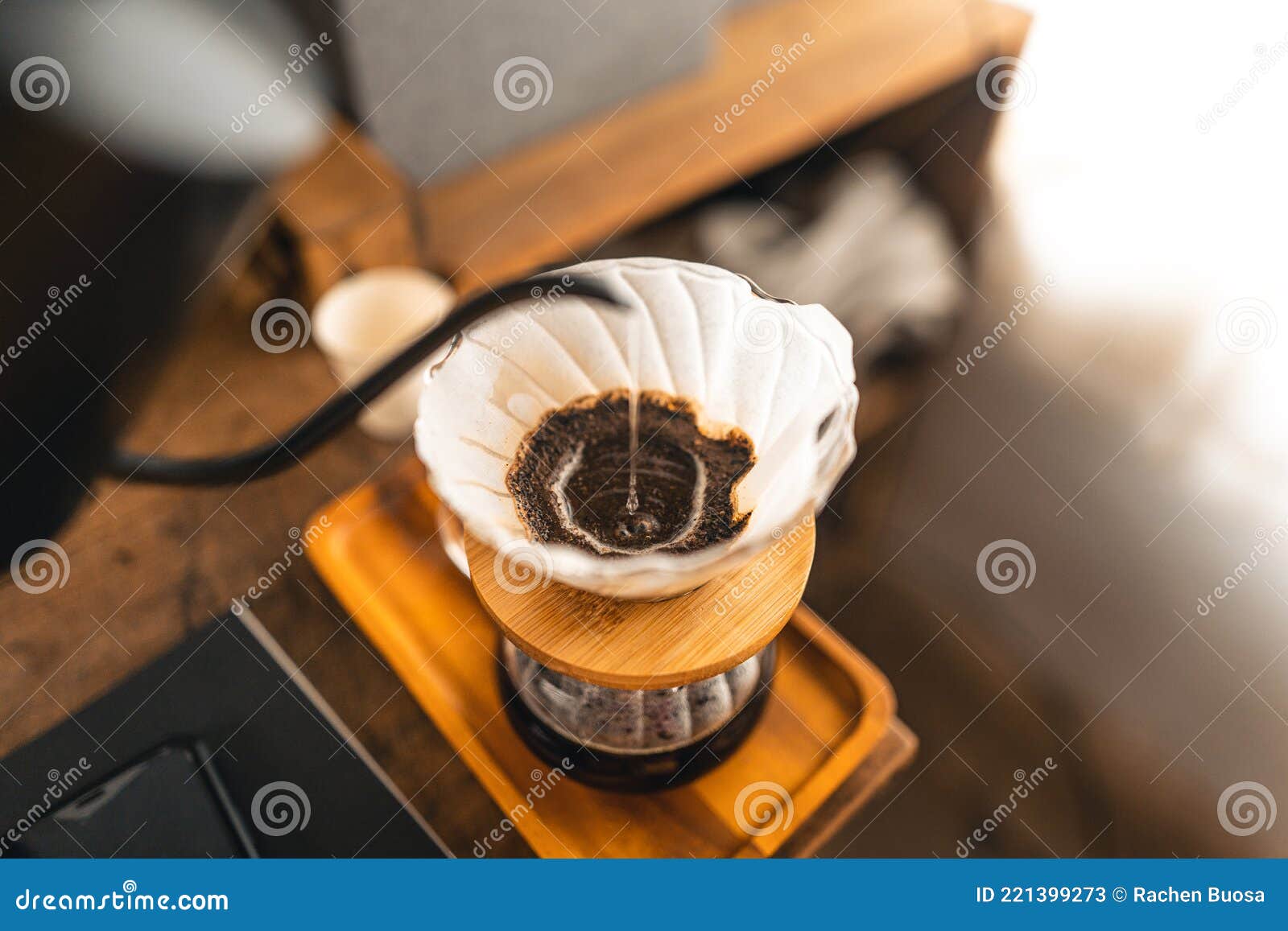 Drip Coffee, Barista Pouring Water on Coffee Ground with Filter Stock