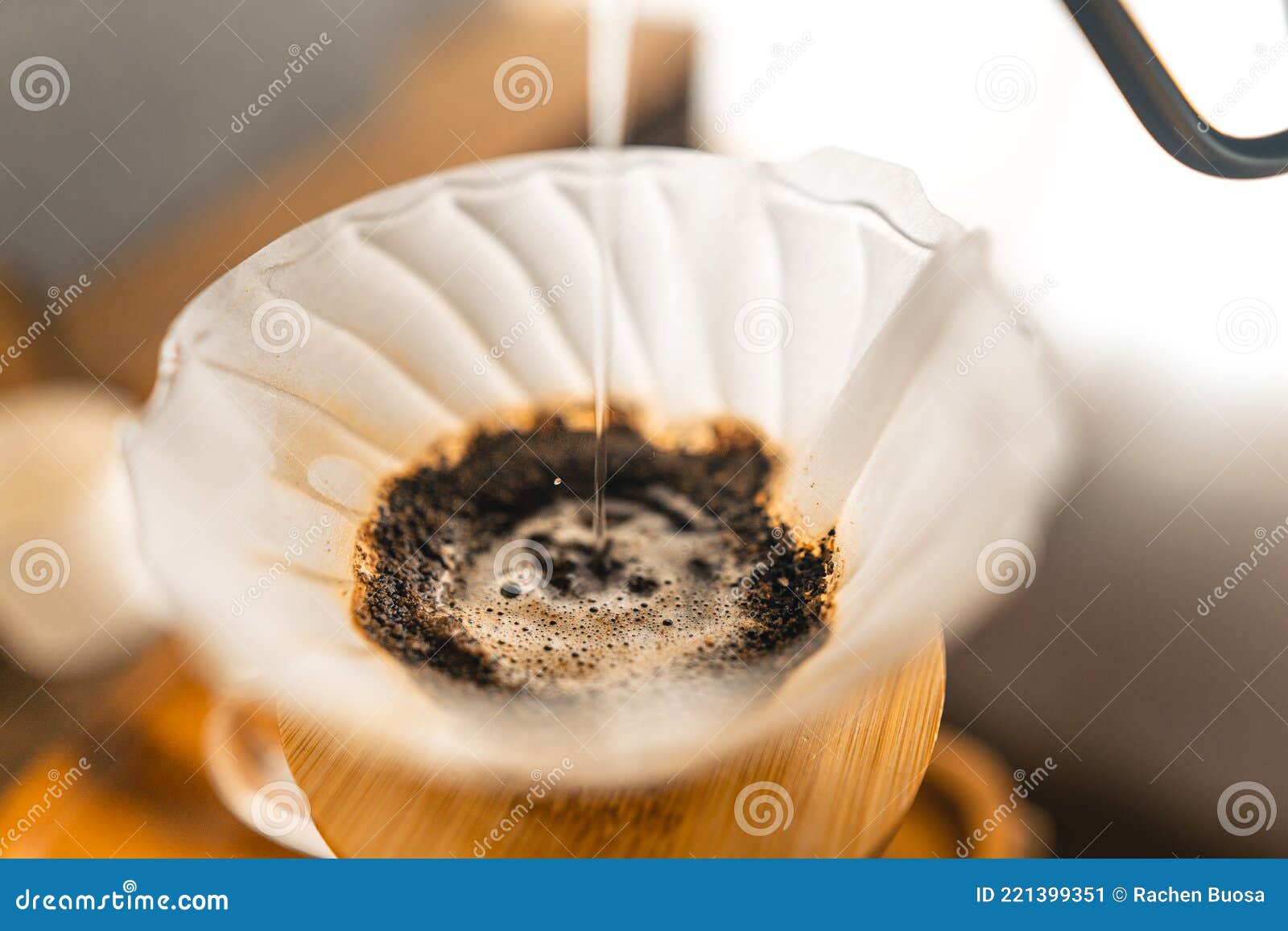 Drip Coffee, Barista Pouring Water on Coffee Ground with Filter Stock