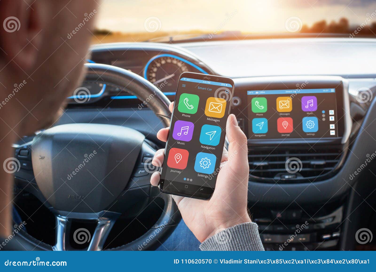 driver uses a mobile phone with smart driving assistance apps