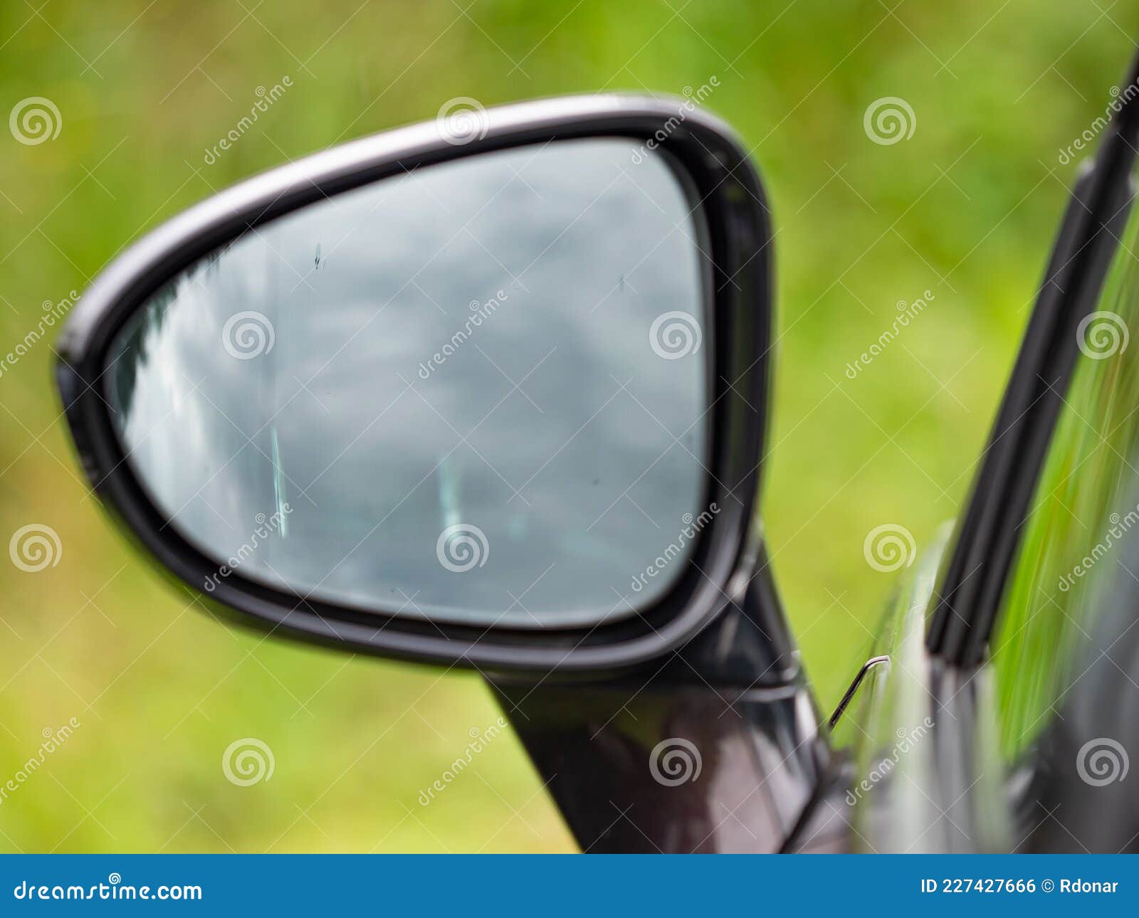 Drivers Wing Mirror with Inclear View into Cabin. Modern Car Stock