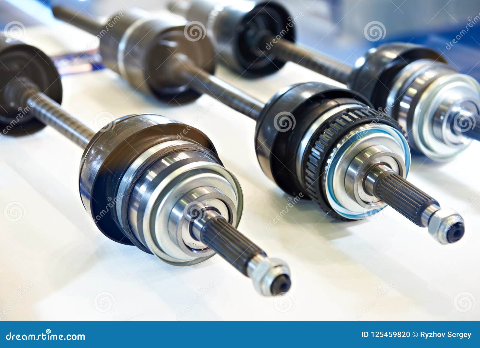 Driveshaft axles in shop stock photo. Image of power 125459820