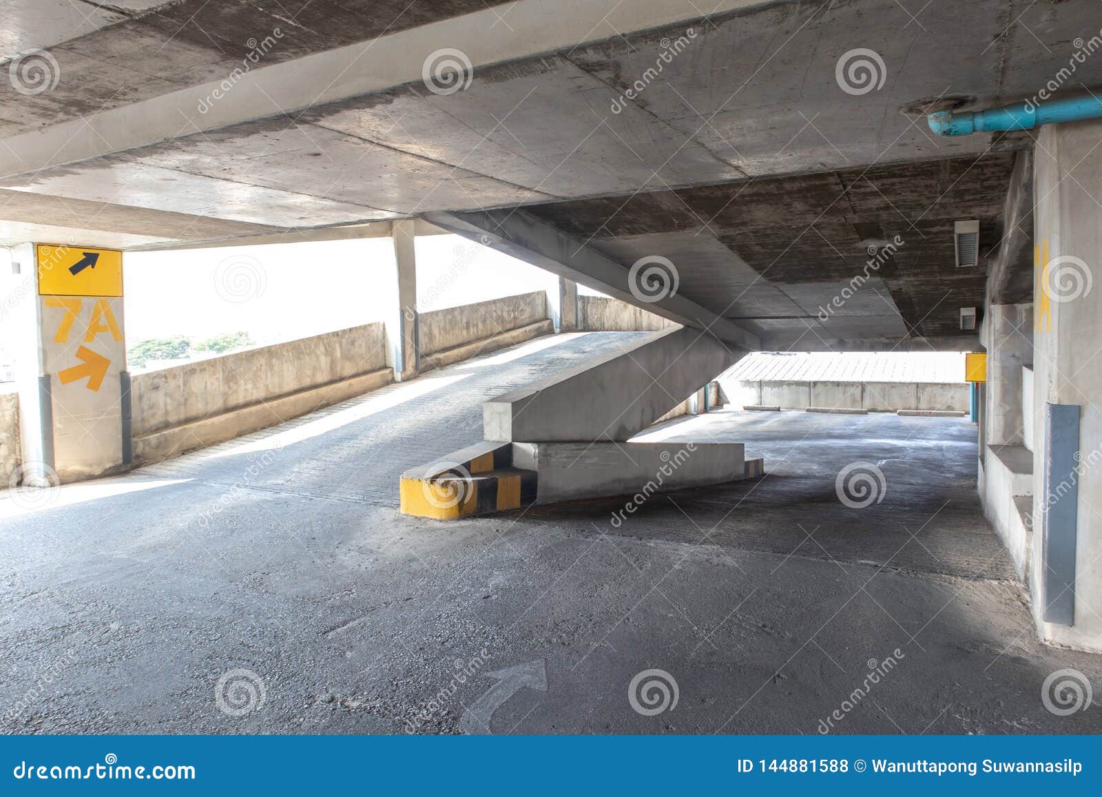 Driveway Up and Down Way in Parking Garage Stock Photo - Image of light ...