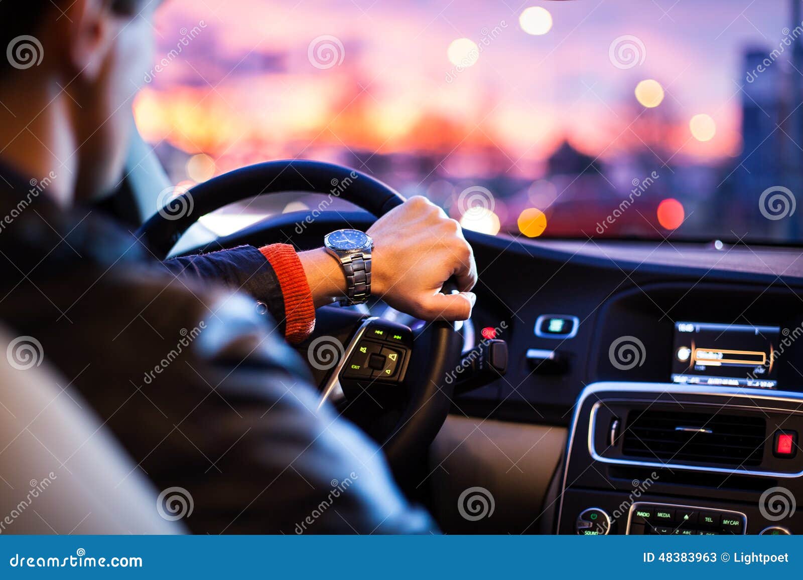 driving a car at night -man driving his modern car at night