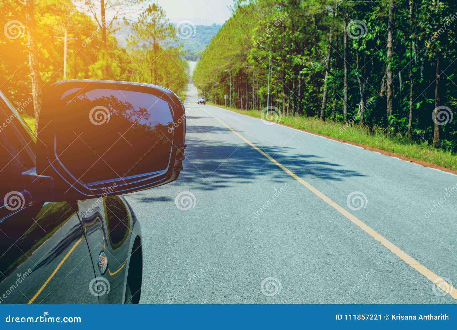 Driving Down the Road. Driving Car on Asphalt Road in Summer Stock