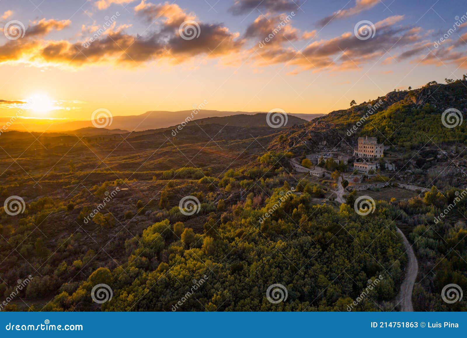 drone aerial panorama of termas radium hotel serra da pena at sunset in sortelha, portugal