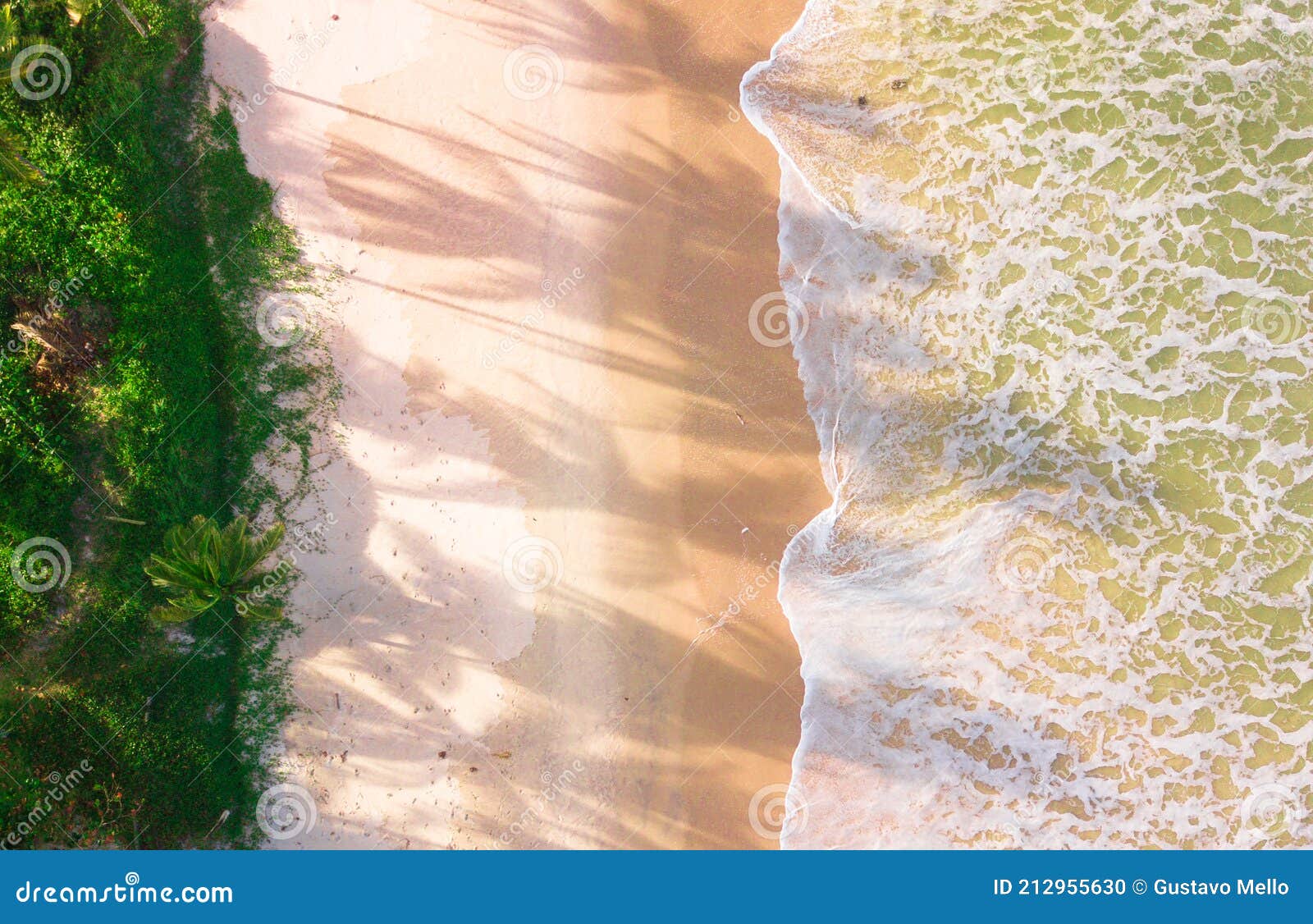 drone aerial view beach waves at sunset