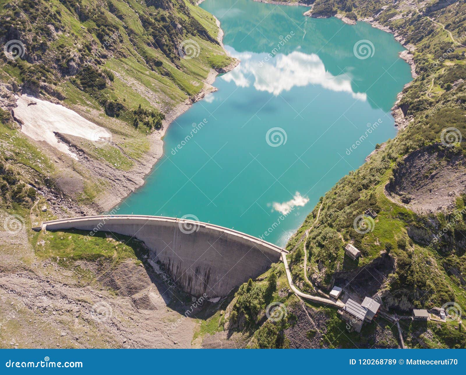 drone aerial view of the lake barbellino an alpine artificial lake and the mountain around it. italian alps. italy