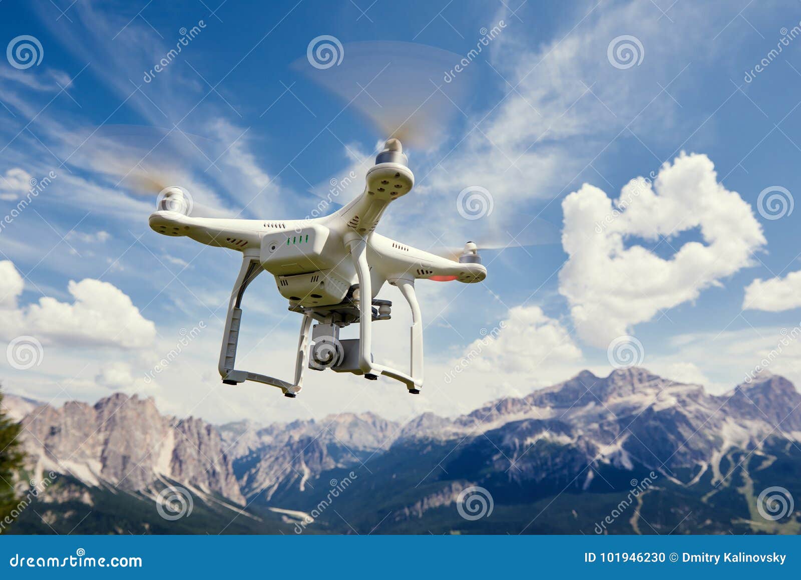 drone copter flying with camera in mountains