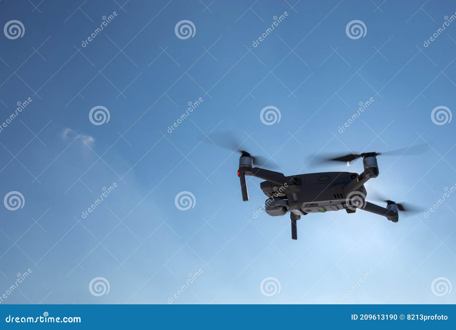 Drone Flying in the Blue Sky , Drone Flying in Sunlight Stock Photo