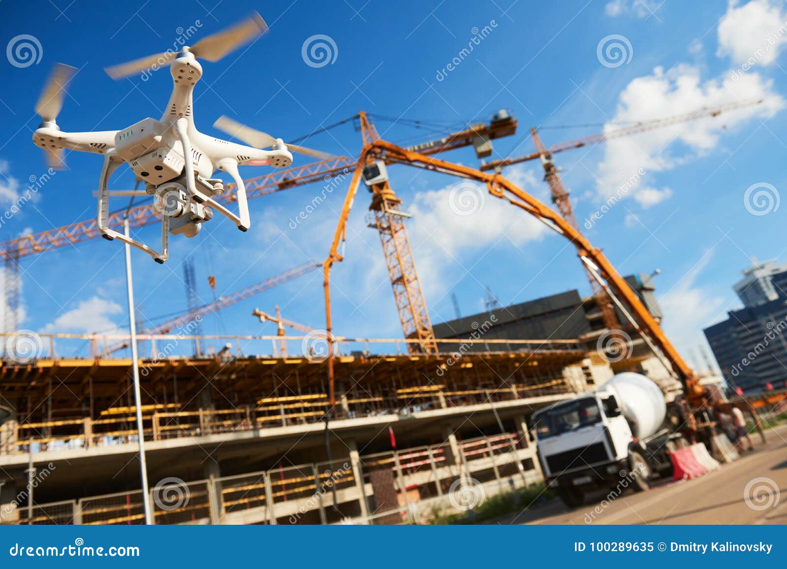 drone over construction site. video surveillance or industrial inspection