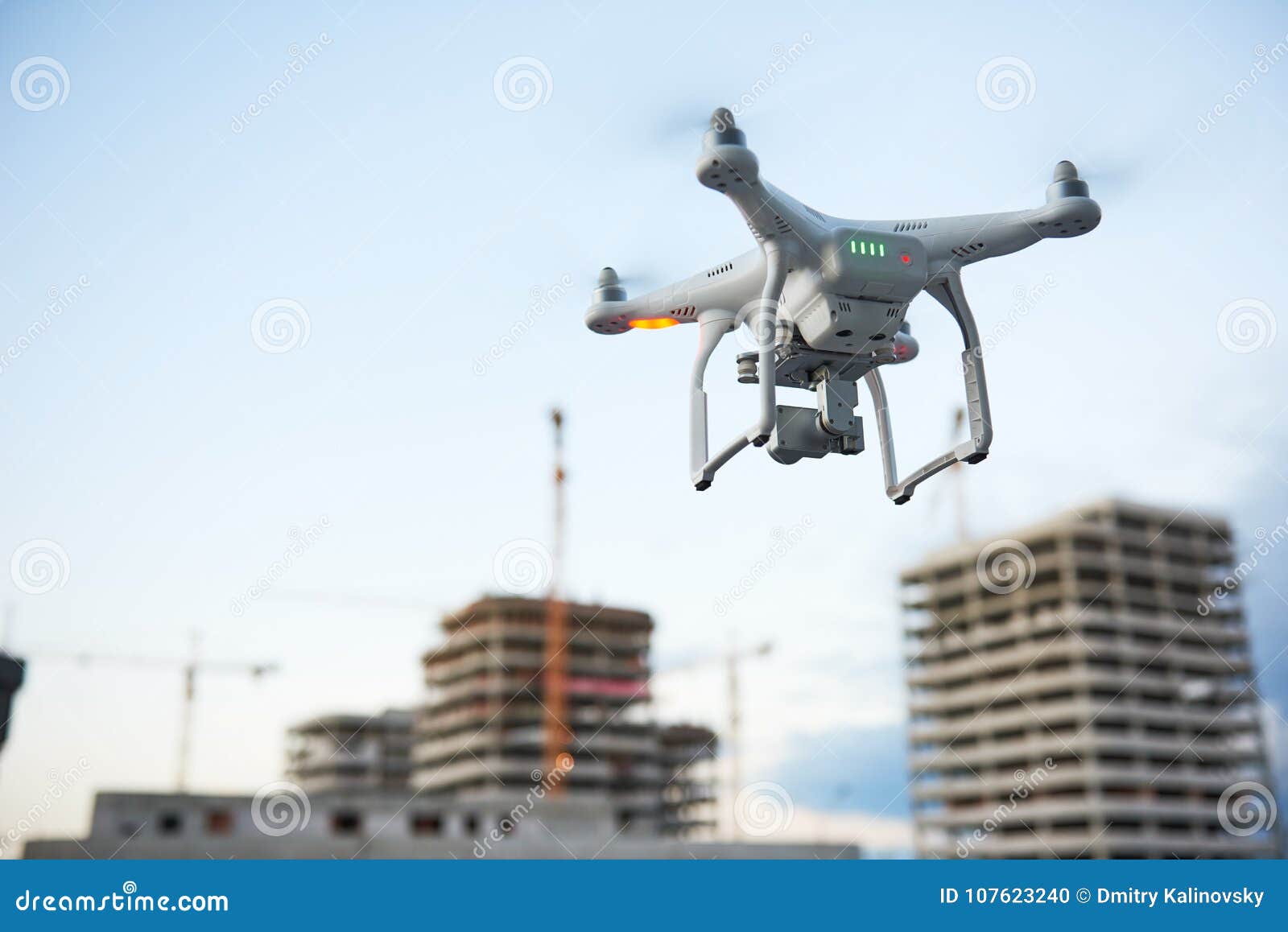 drone over construction site. video surveillance or industrial inspection