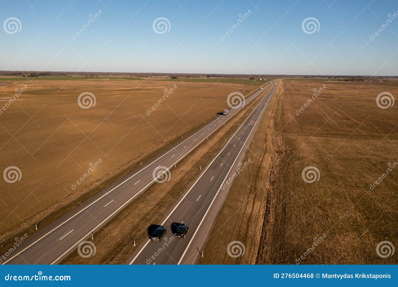 Drone Photography of Highway Surrounded by Agriculture Fields and