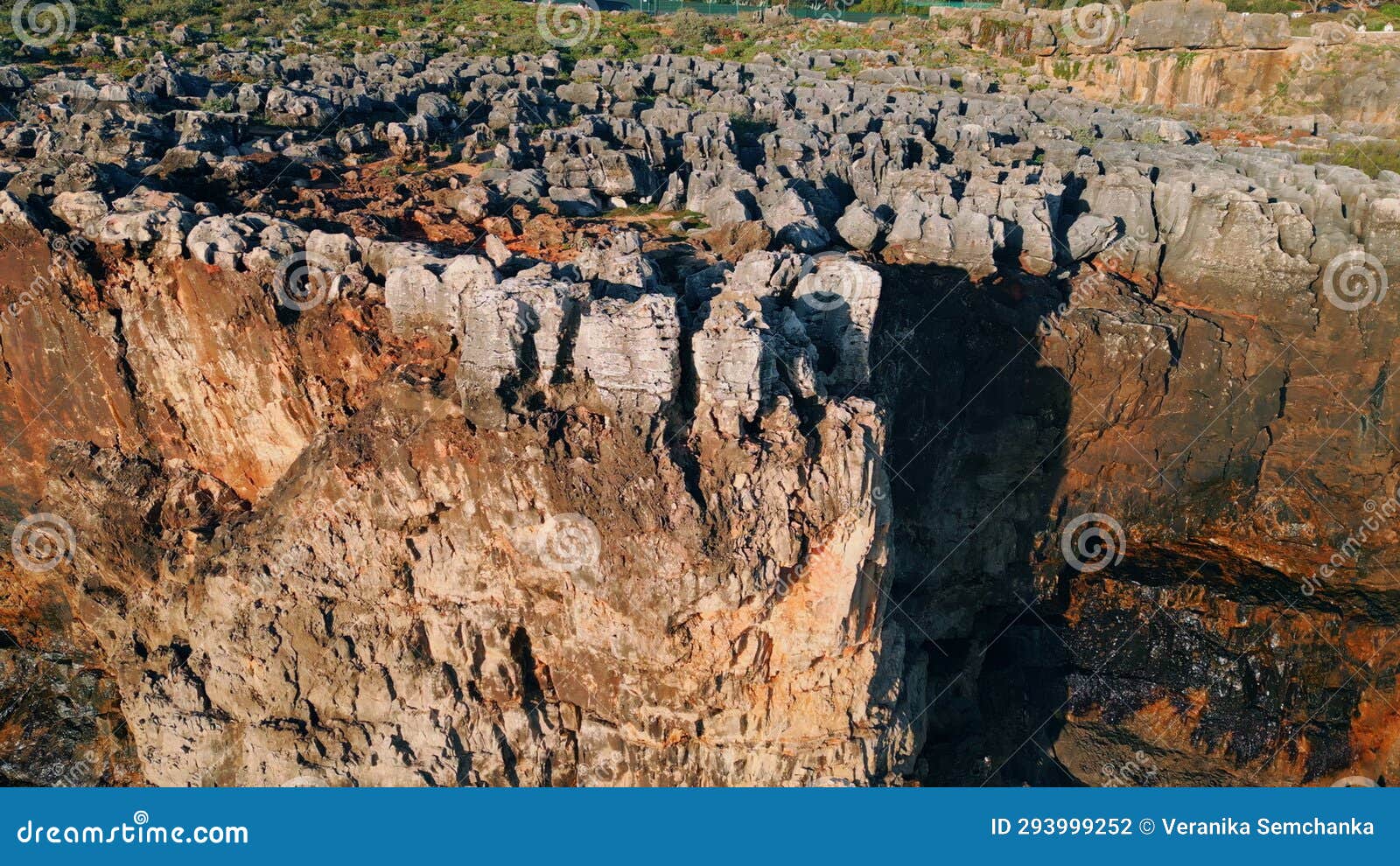 drone rough stony rocks under summer sunlight. dangerous cliff rugger stones.