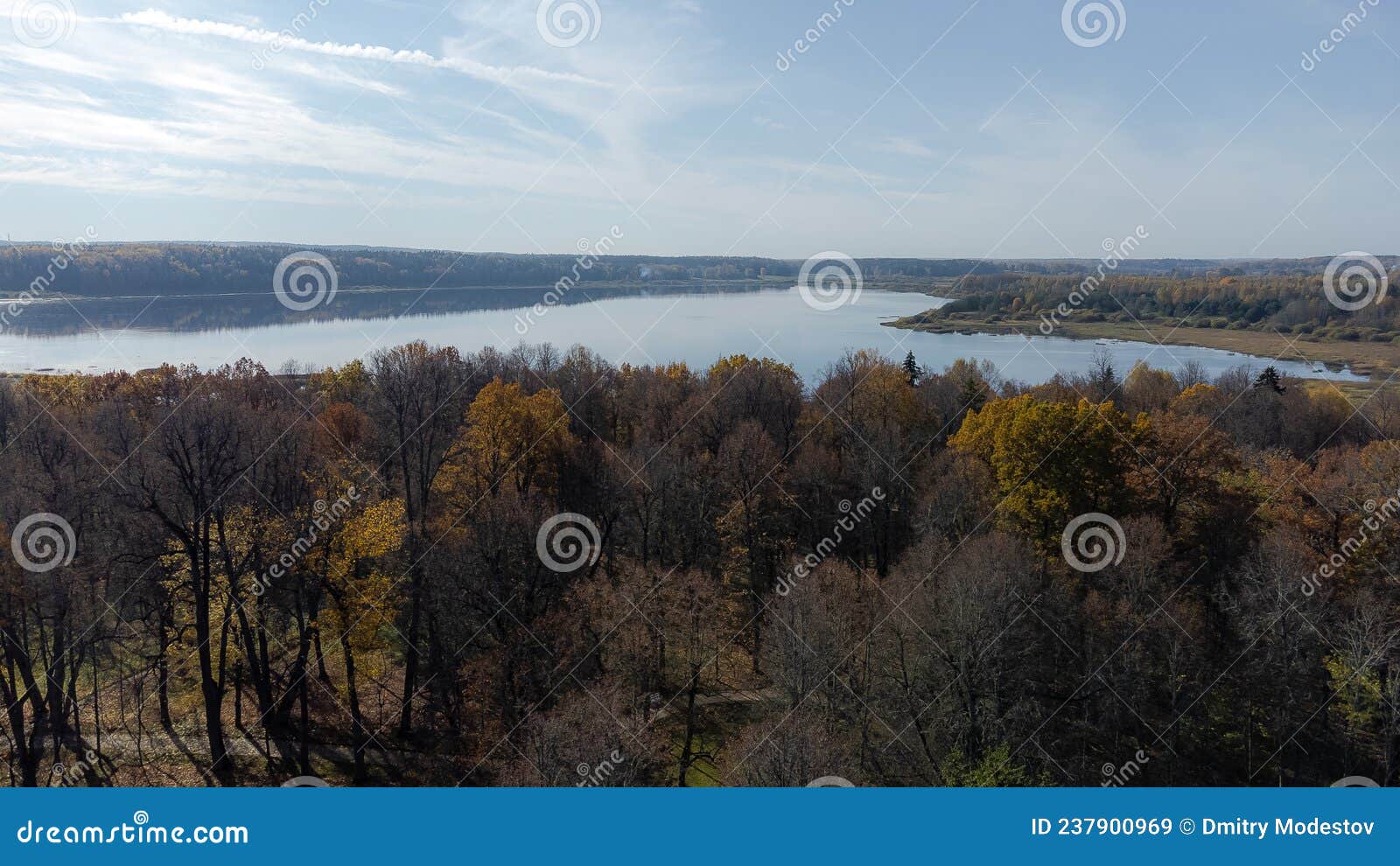 drone shot over park and lake