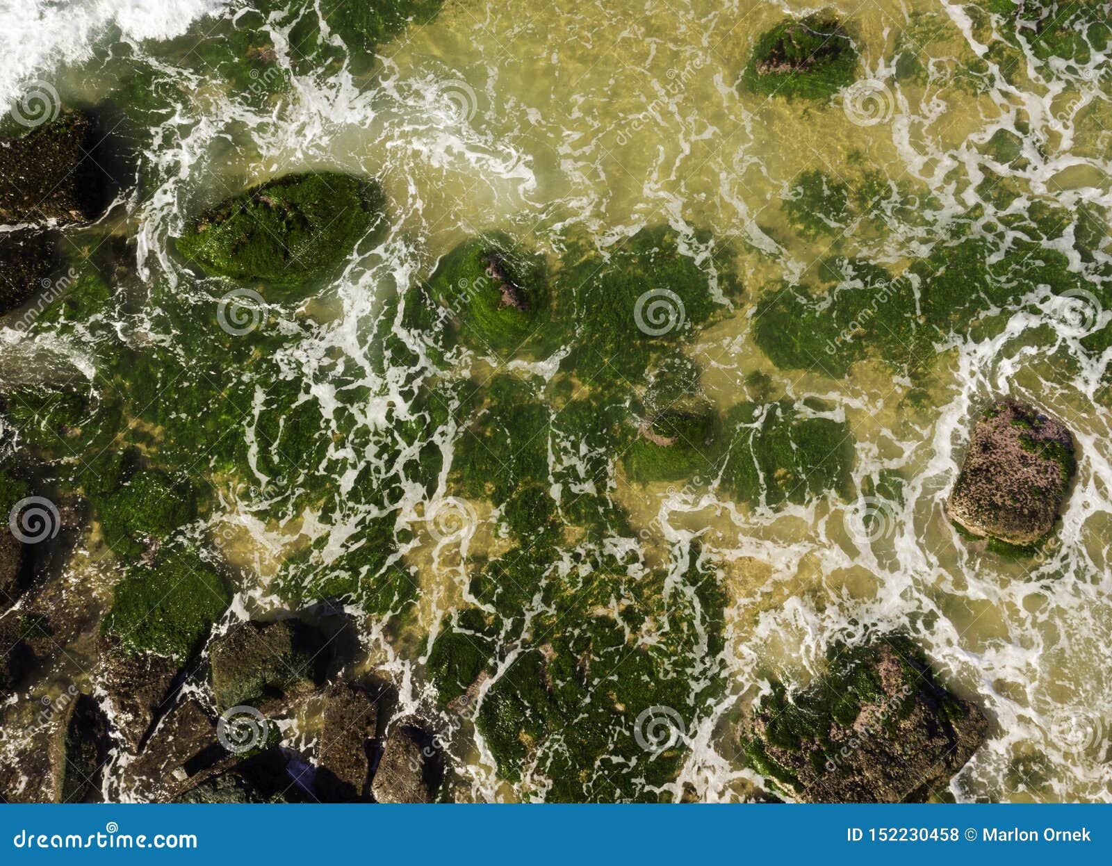 Aerial View of Waves Breaking on Rocks at Low Tide Stock Photo - Image ...