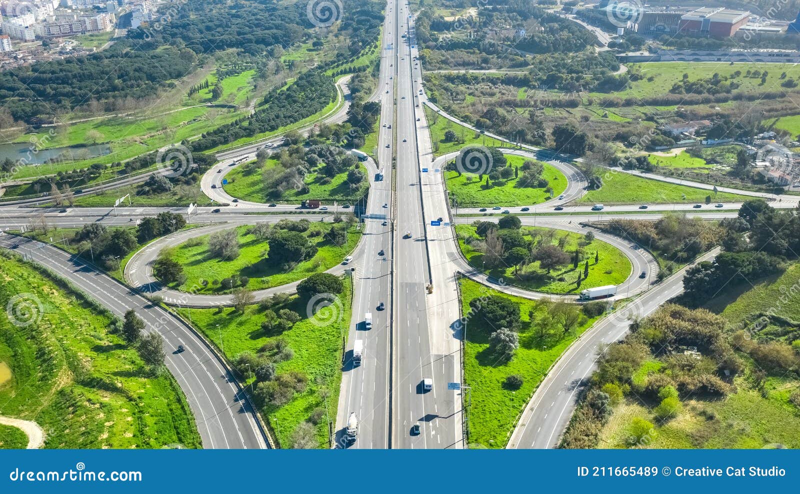 drone view of cloverleaf interchange. highway road junction. portugal, almada