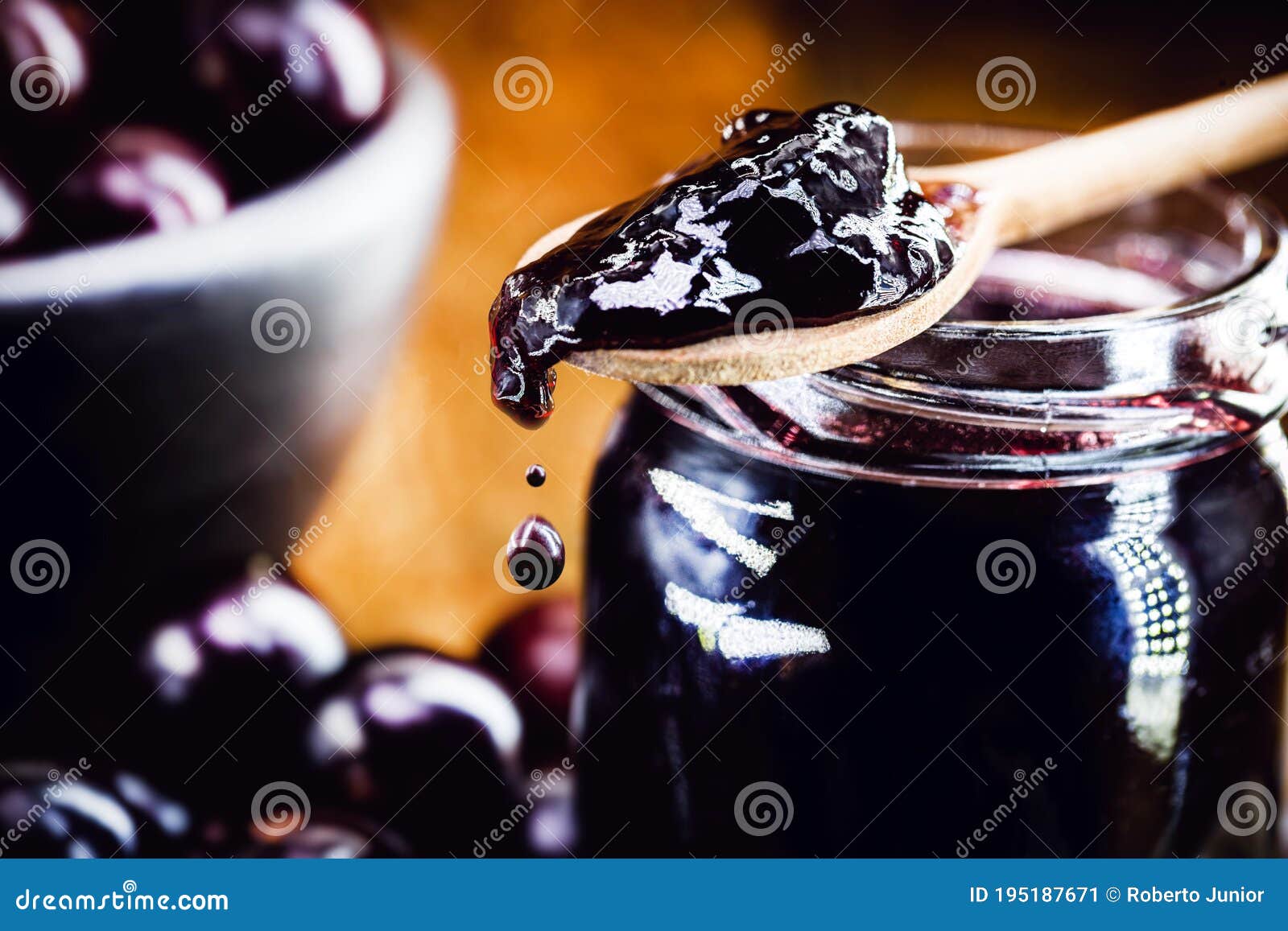 Drop of Jam Dripping from the Spoon. Brazil Grape Jelly, Called