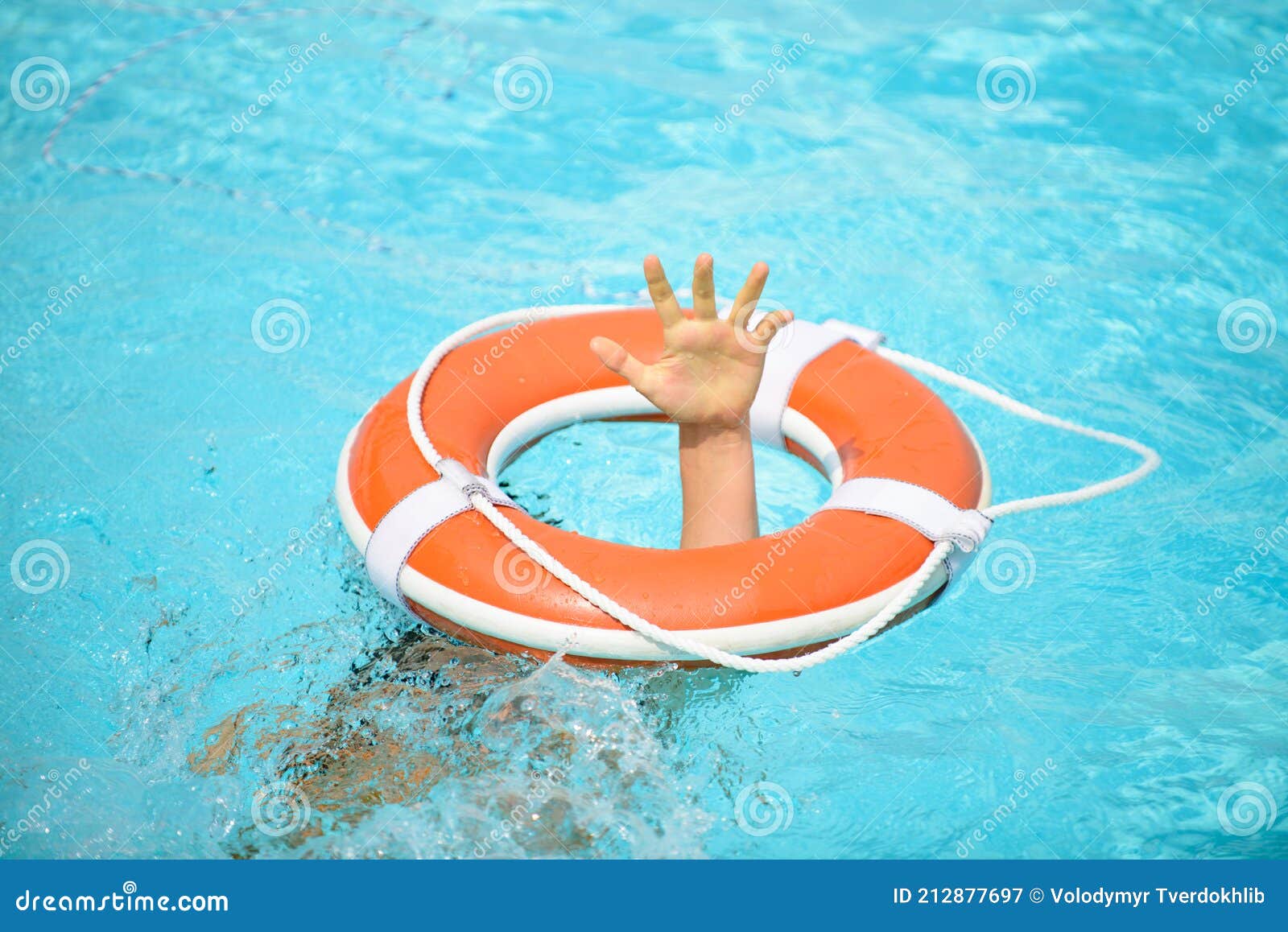 Lifebuoy To Save Peopleon Beach On Blue Sea Background RoyaltyFree