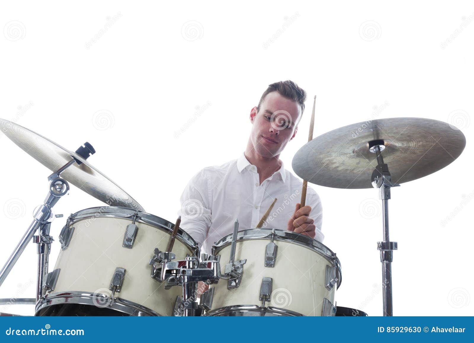 Drummer Behind Drum Set Wears White Shirt and Plays the Drums Stock ...