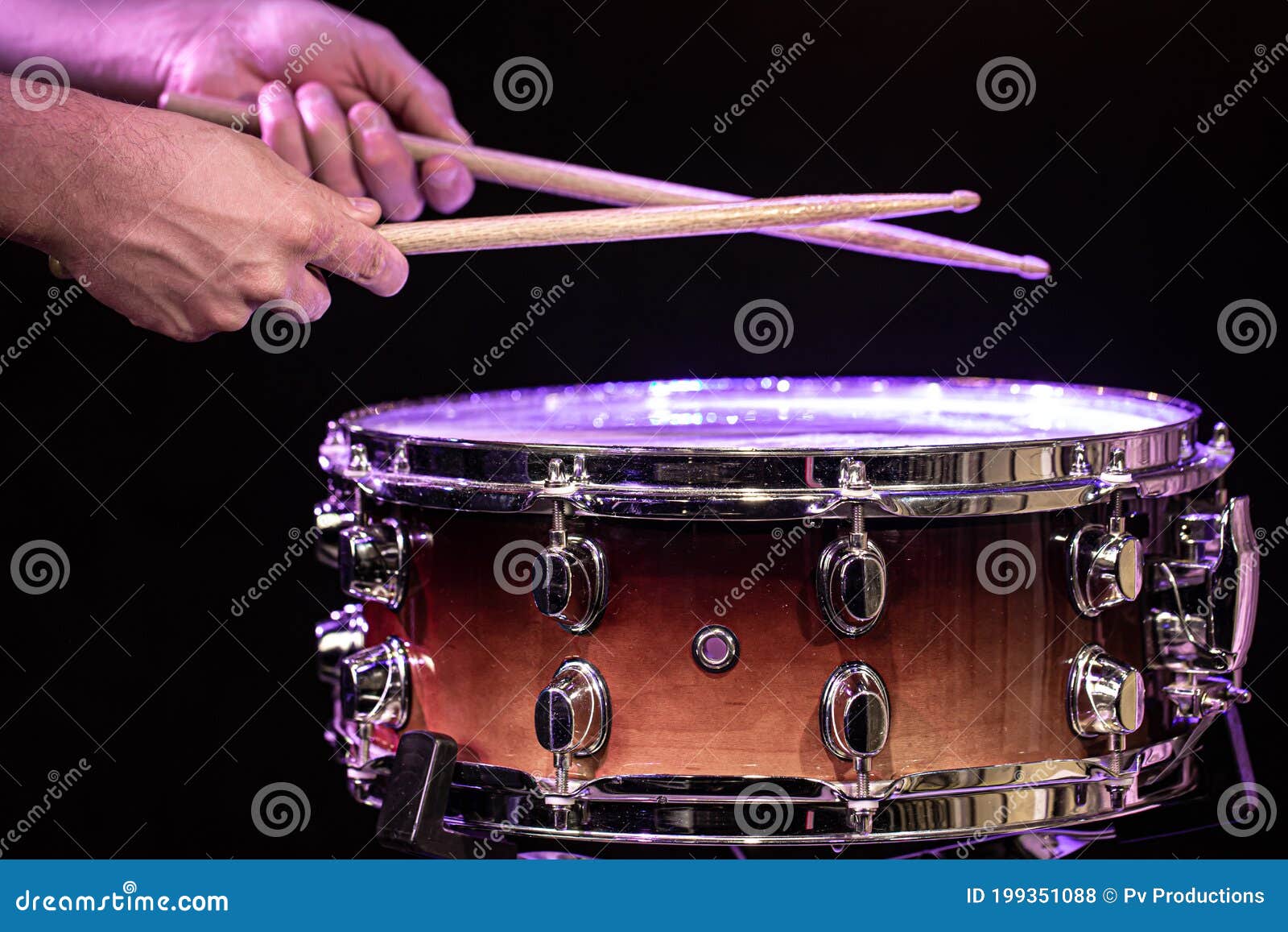 Drummer Hitting Drumsticks On Snare Drum On Black Background Close Up