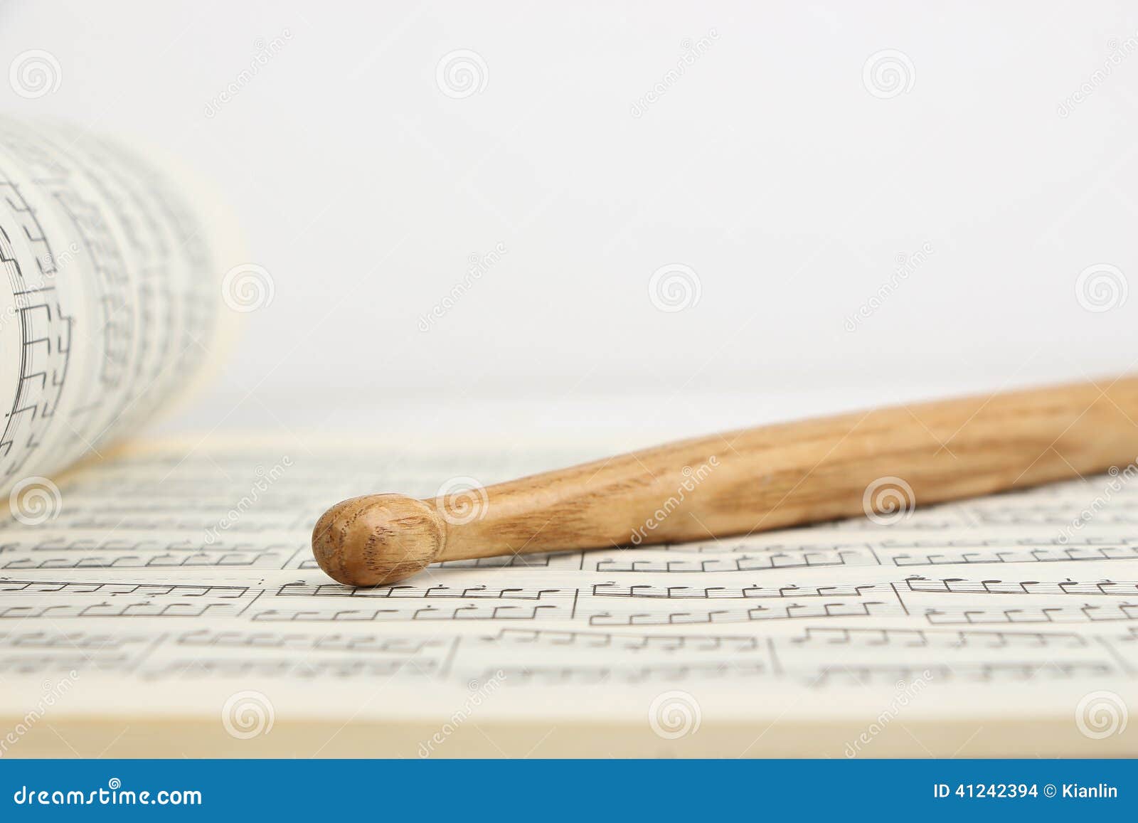 drumstick and music sheet