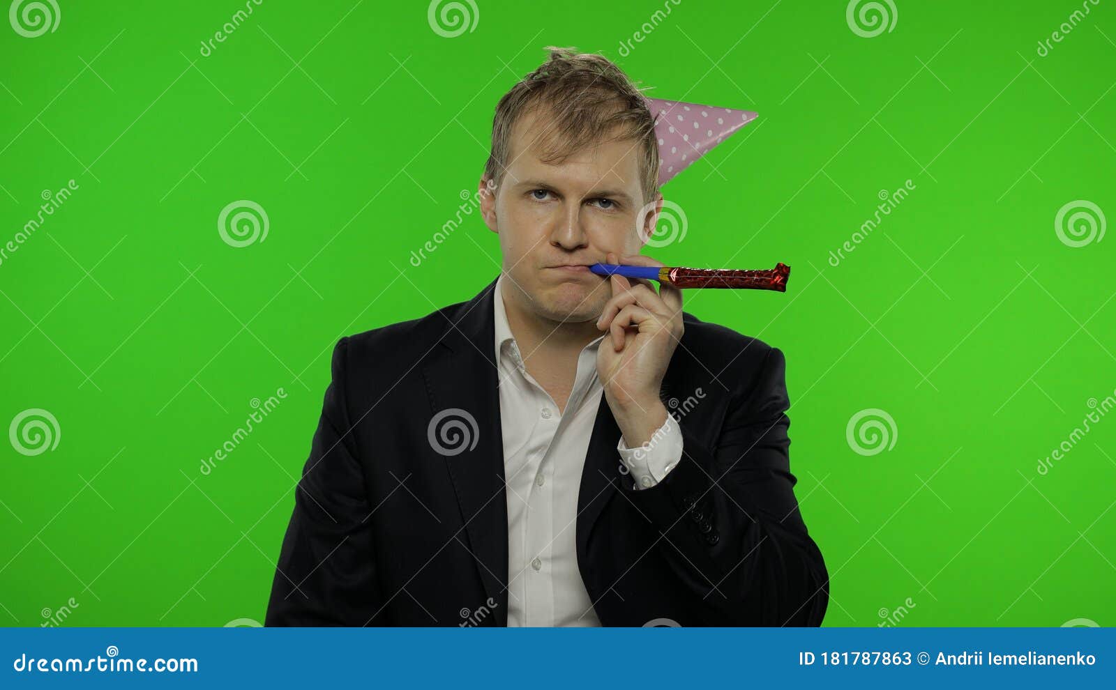 Drunk Disheveled Young Businessman In Festive Cap Blowing A Whistle Hangover Stock Image