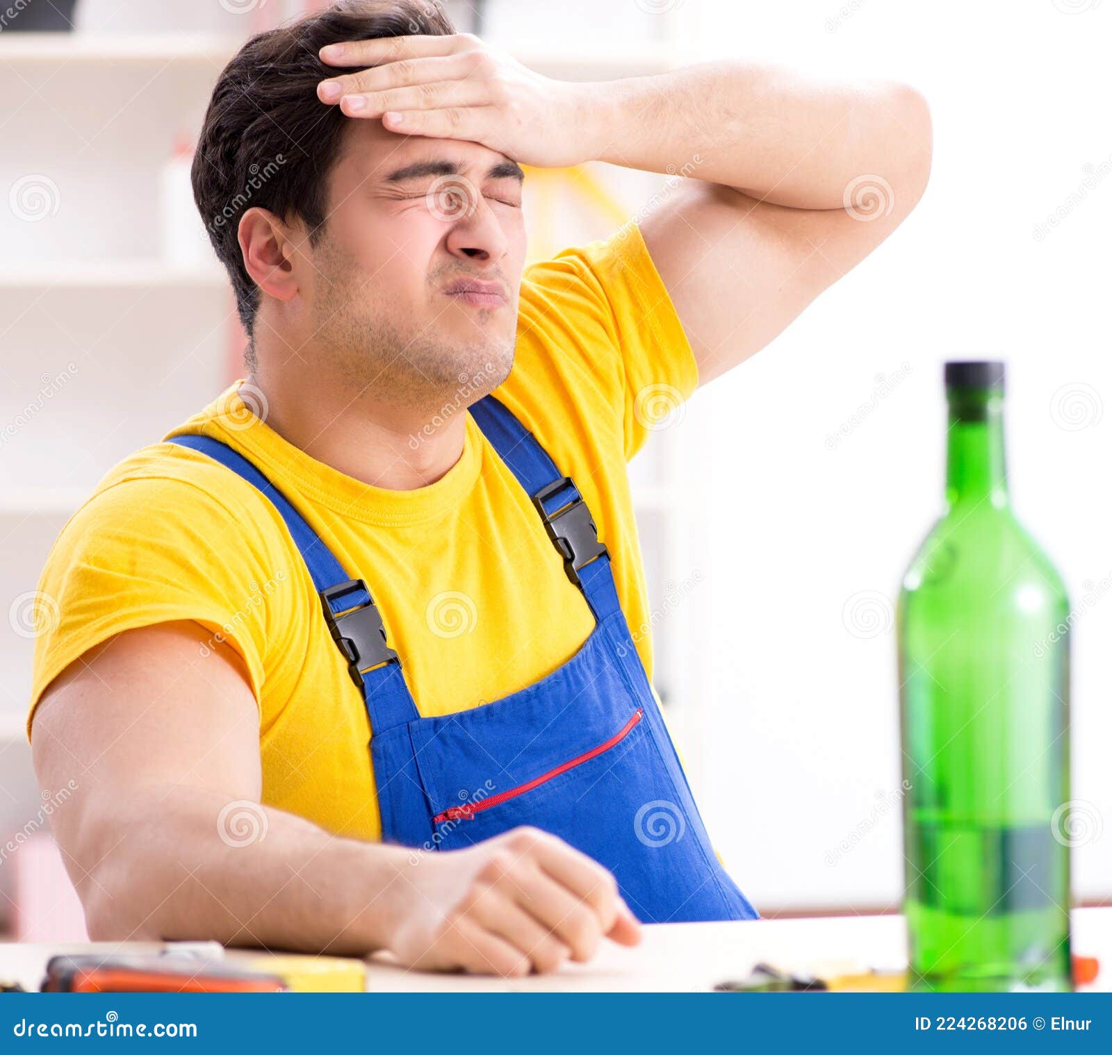 Drunk Engineer Working in the Stock Photo Image of booze