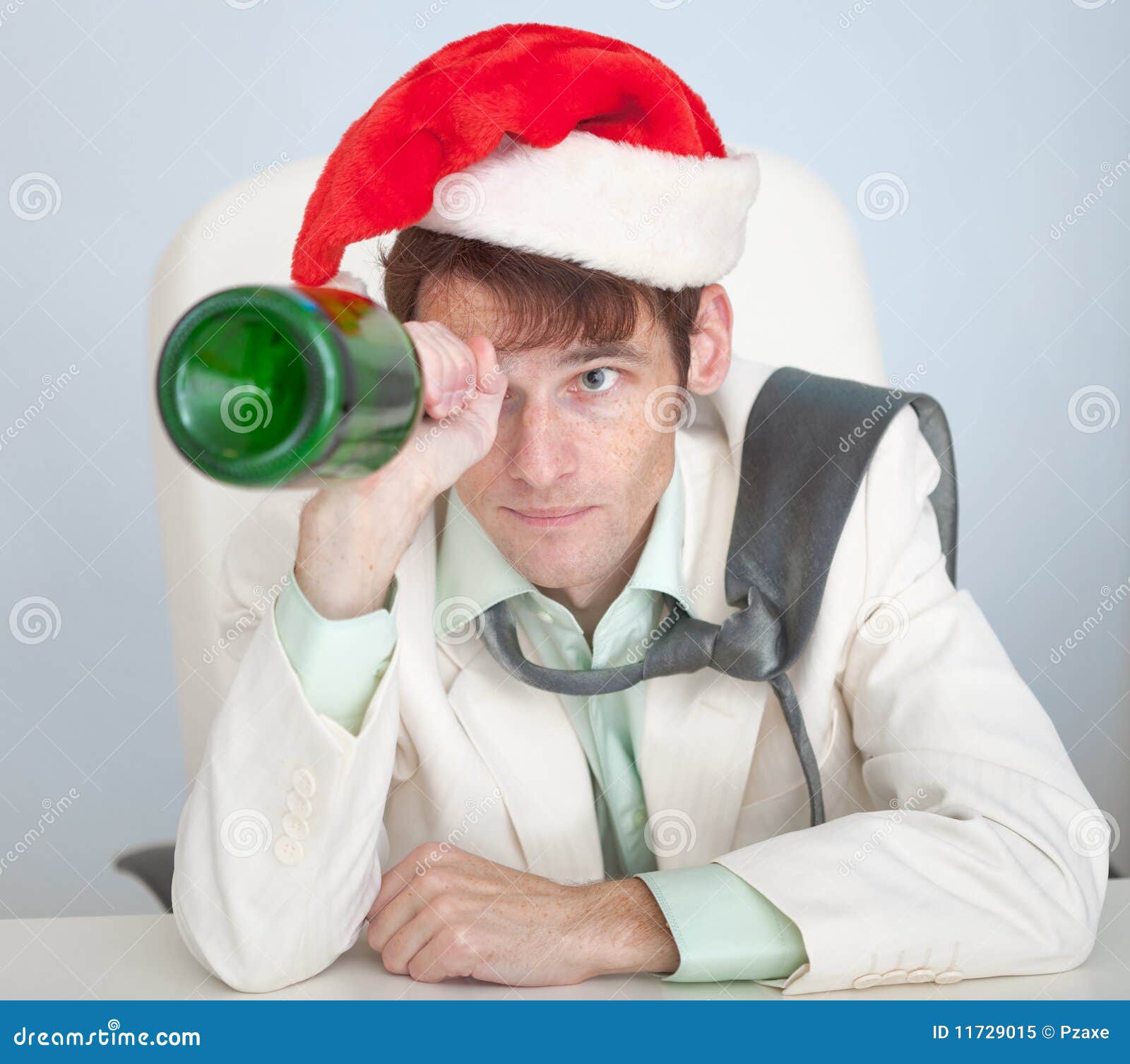 Drunk Man In Christmas Cap Plays With Bottle Stock Image Image Of Celebrating Look 11729015 