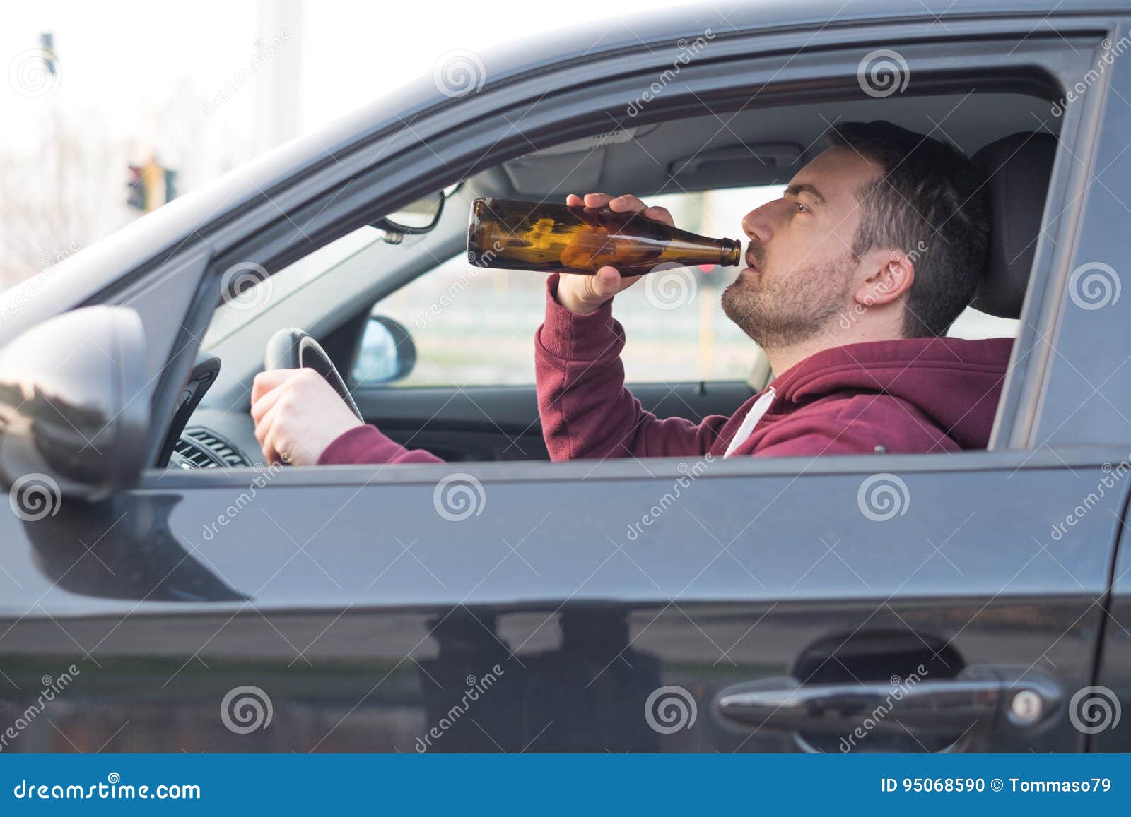 Drunk Man Driving His Car and Drinking Stock Photo Image of attention