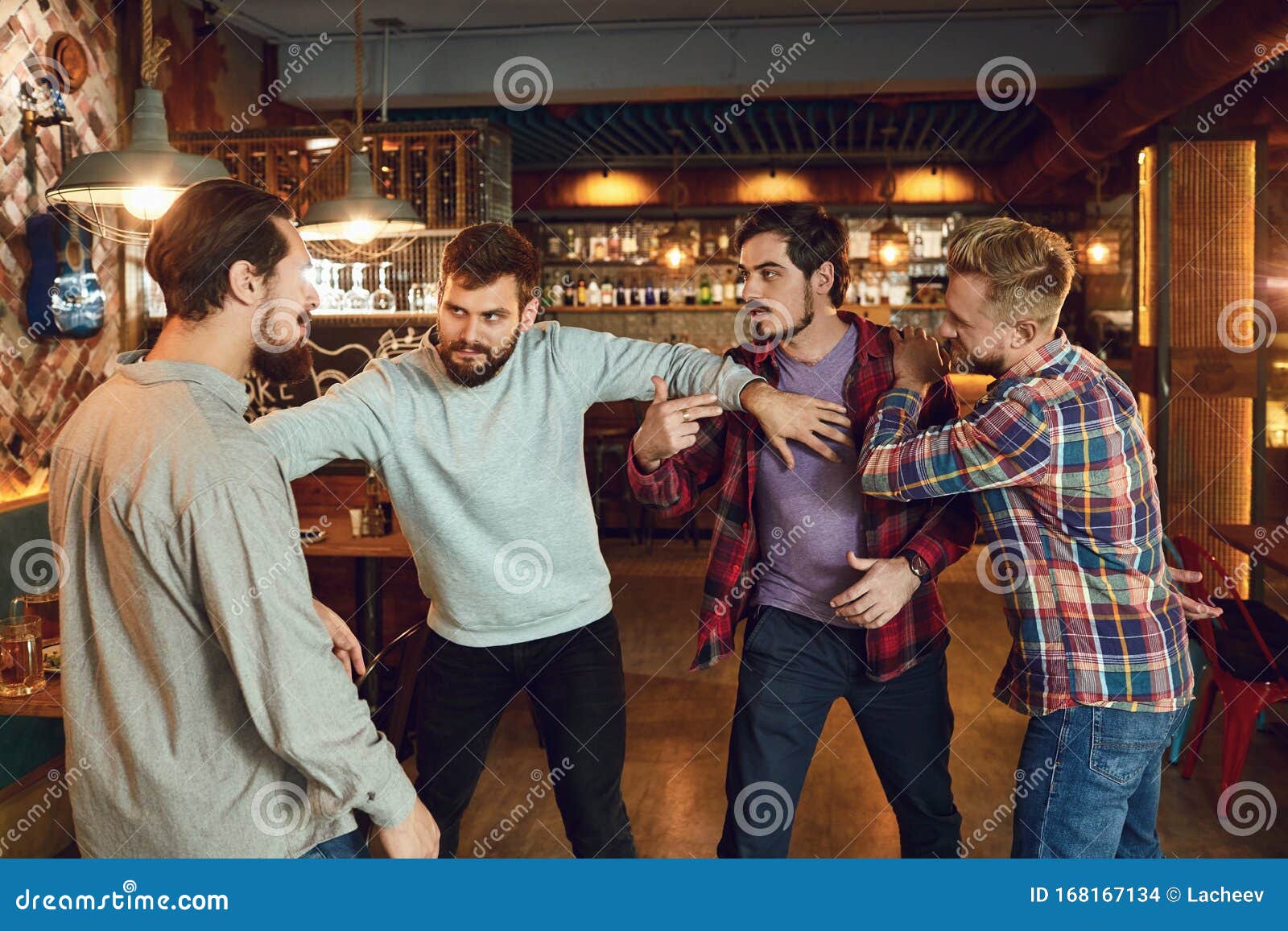 drunk people are fighting in a pub.
