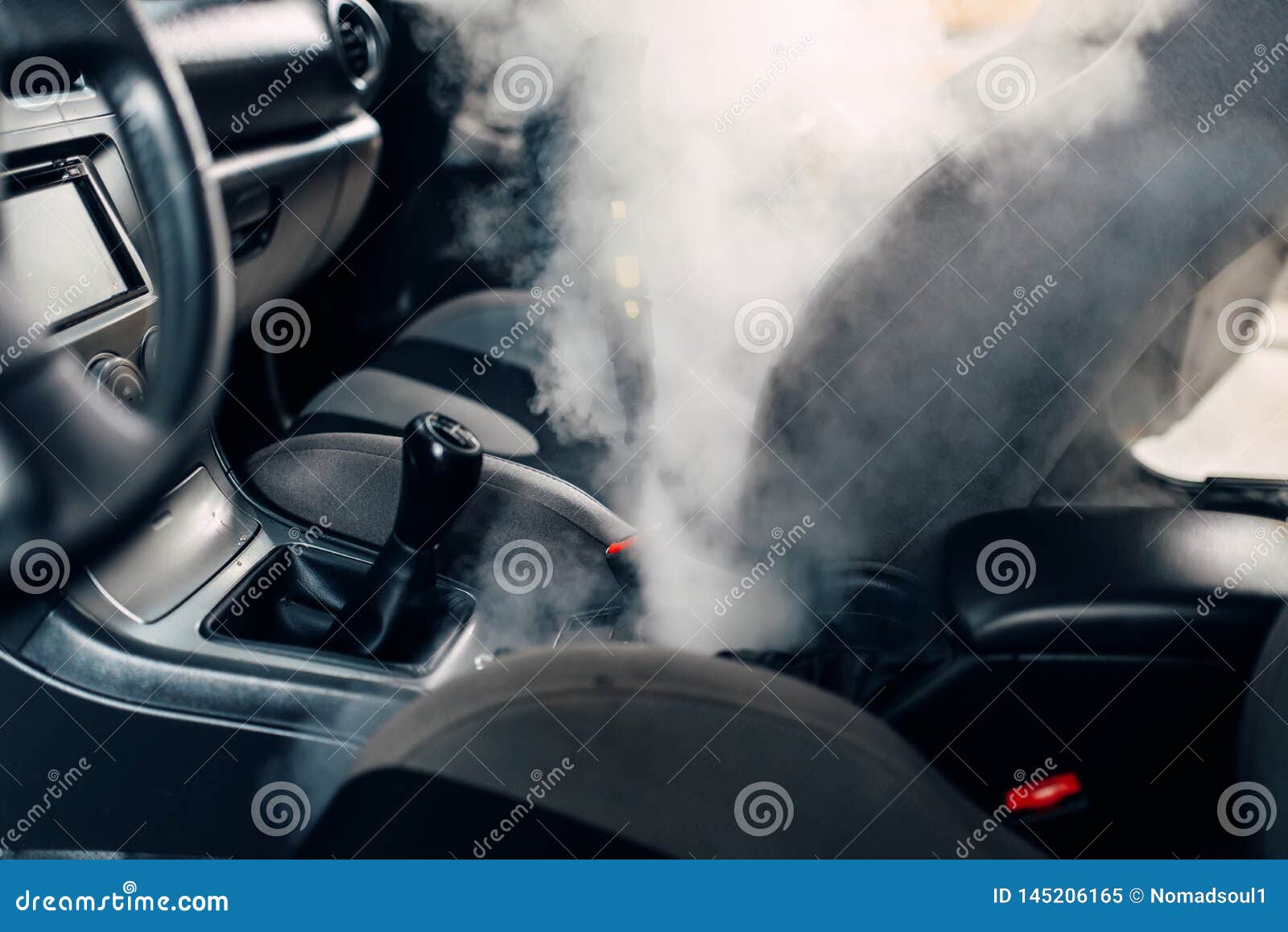 Dry Cleaning Of Car Interior With Steam Cleaner Stock Image