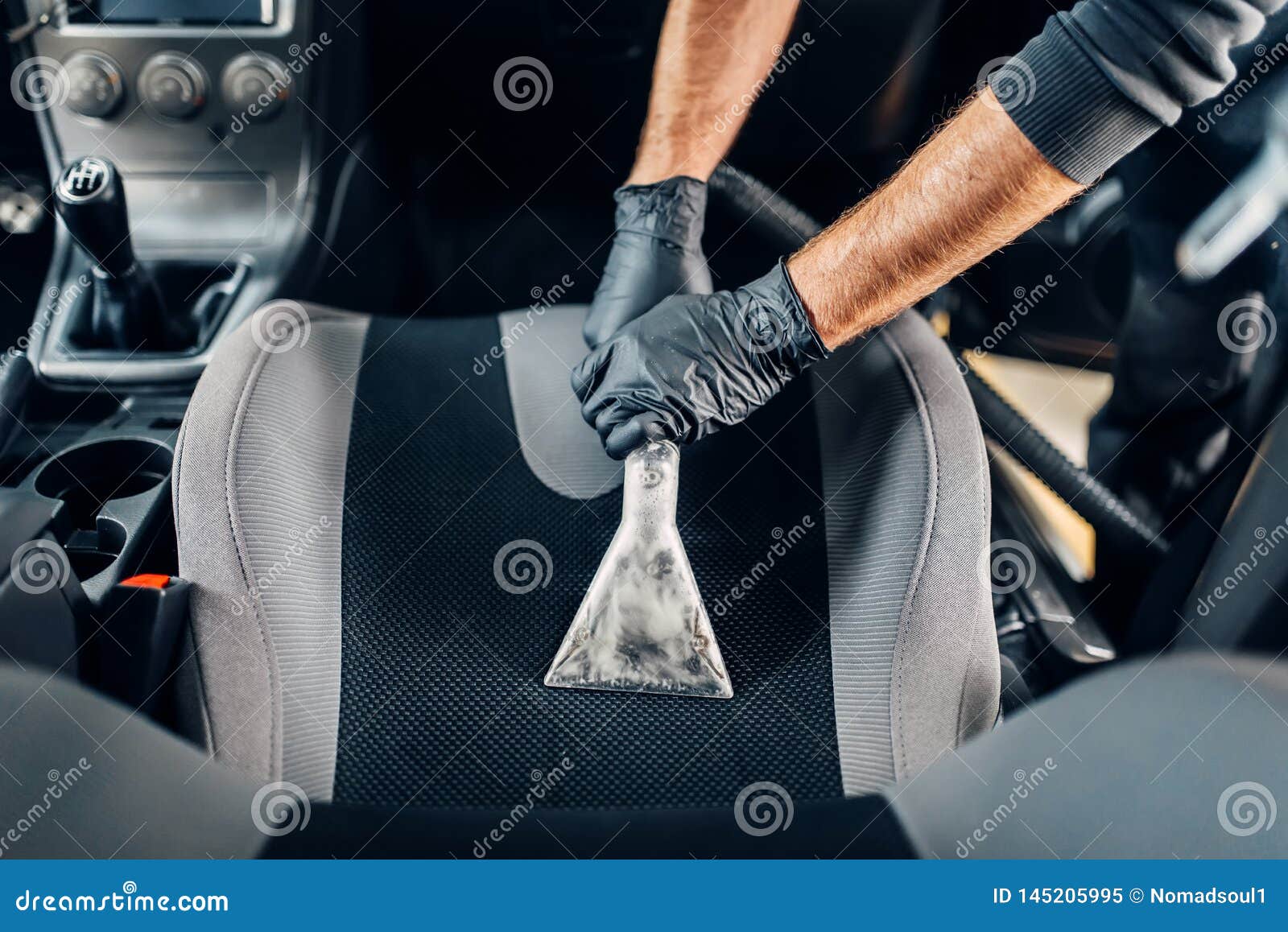 Dry Cleaning Of Car Interior With Vacuum Cleaner Stock Image