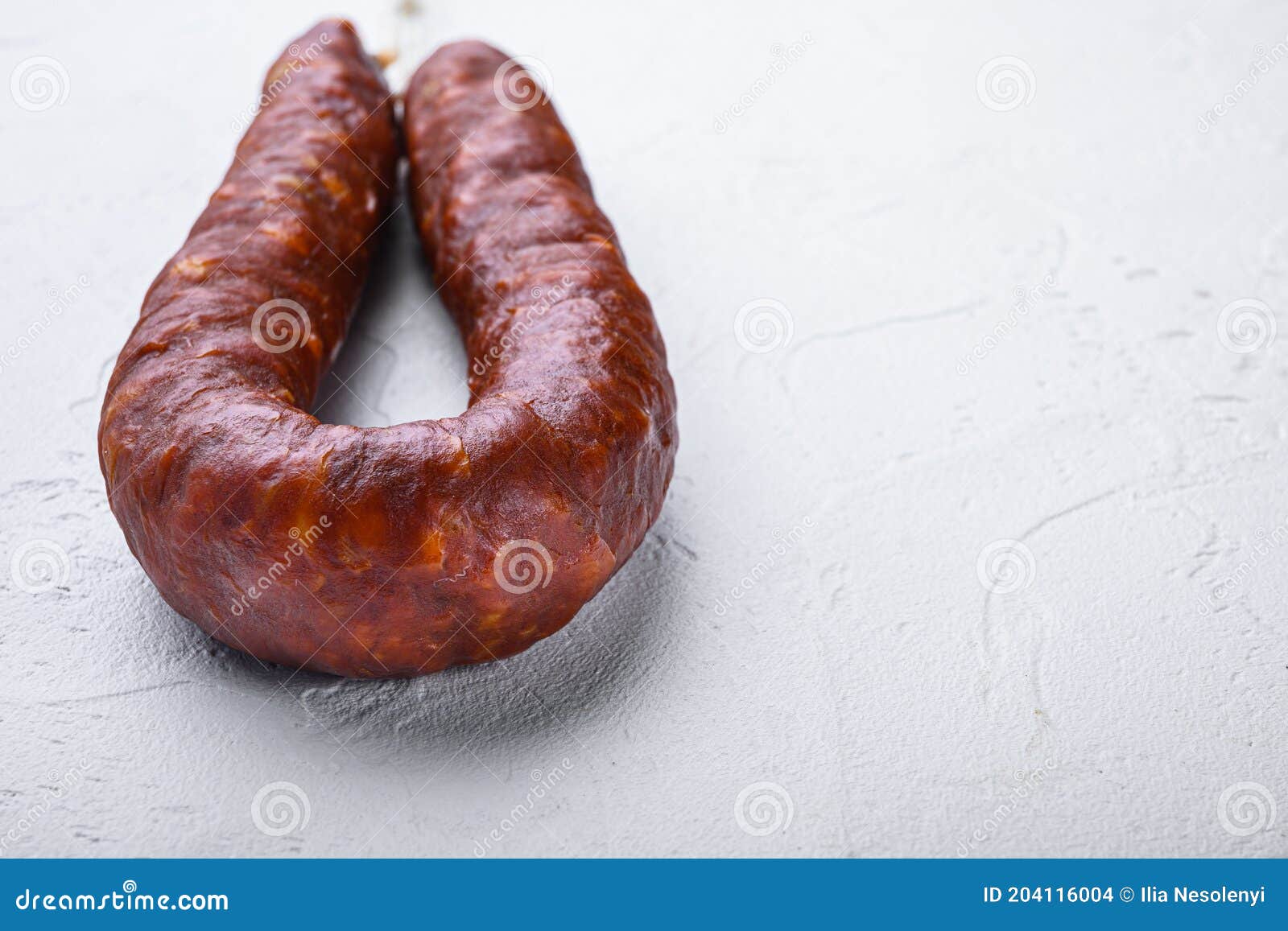 Dry Cured Chorizo Sausage on White Textured Background with Copy Space Stock Photo Image of