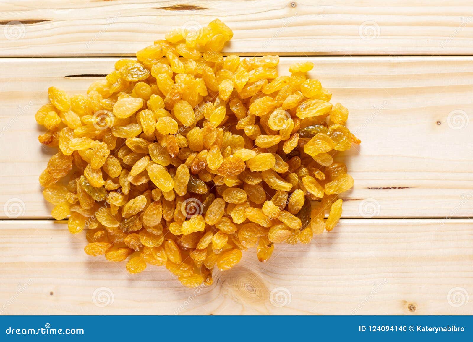 Dry Golden Raisins Sultana on Natural Wood Stock Photo - Image of heap ...