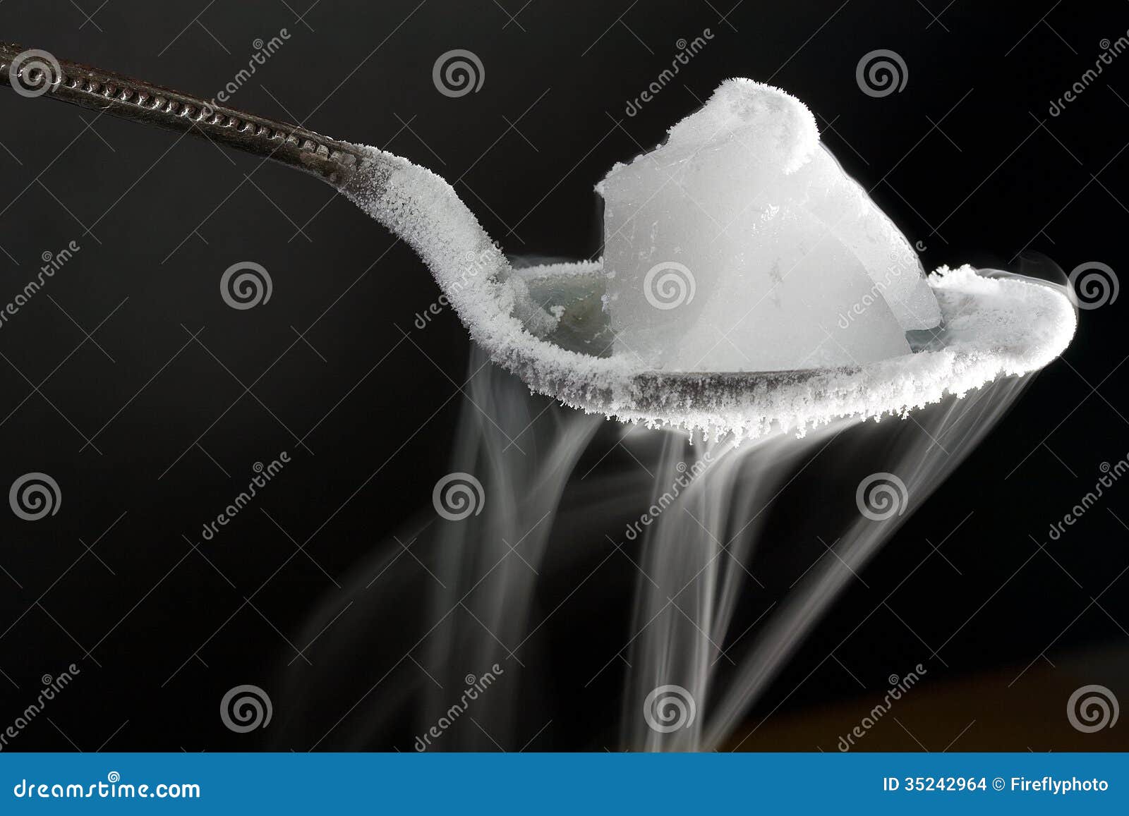 dry ice on metal spoon