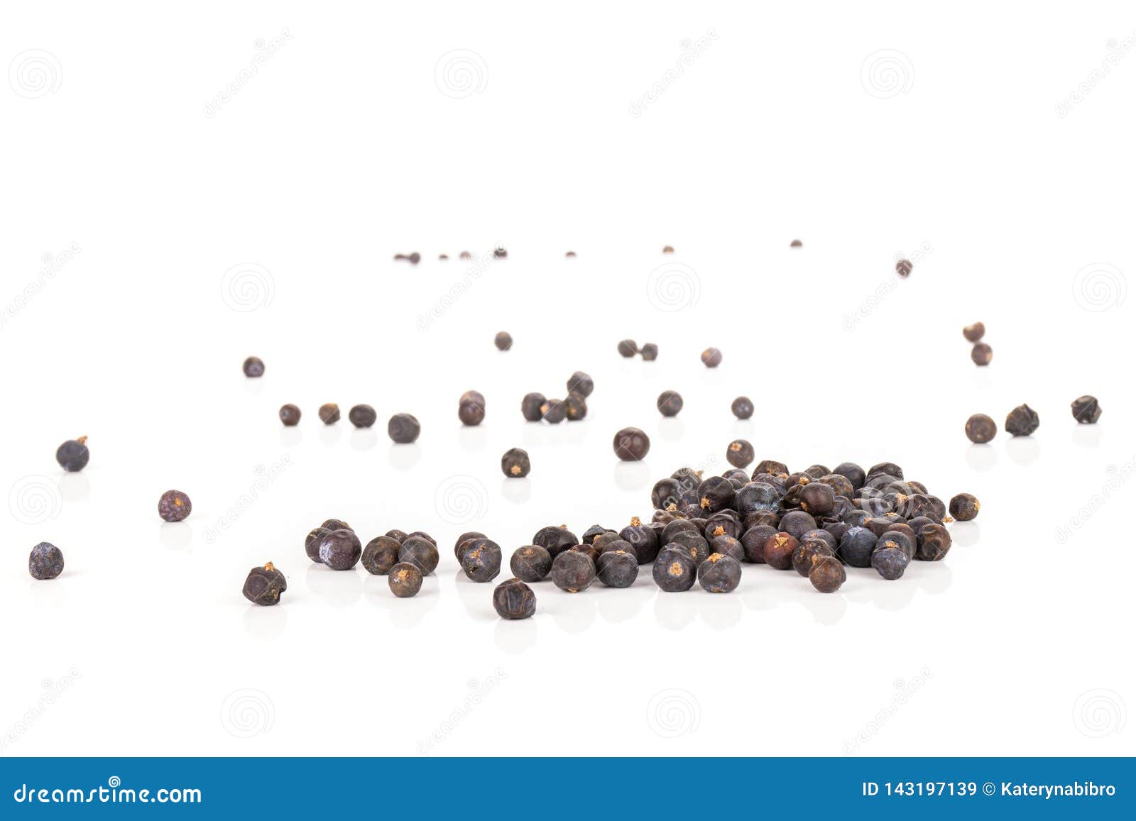 dry juniper berries  on white