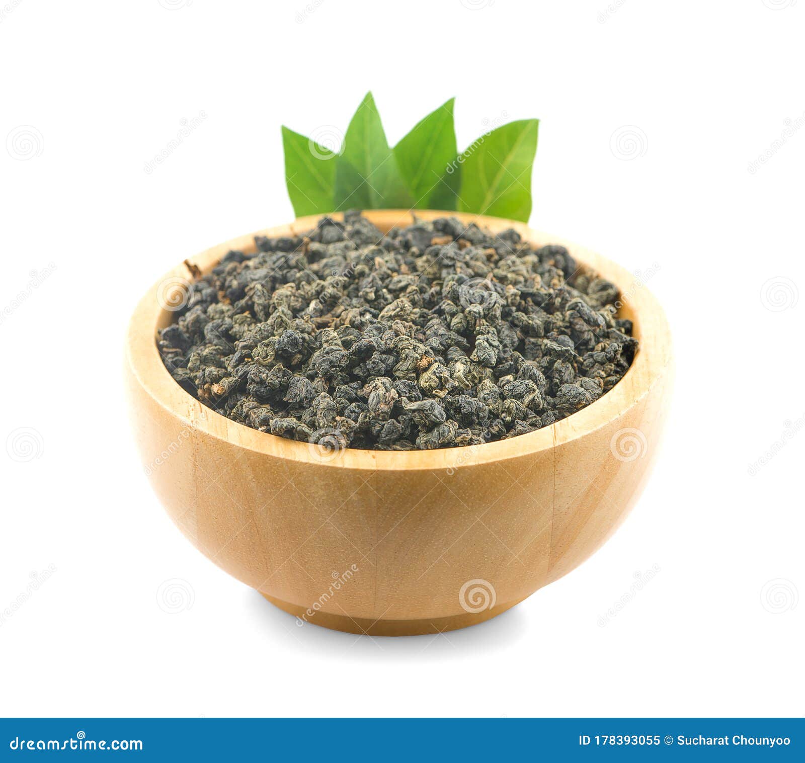 Dry Oolong Tea Leaf and Tea in Wooden Bowl on White Background Stock