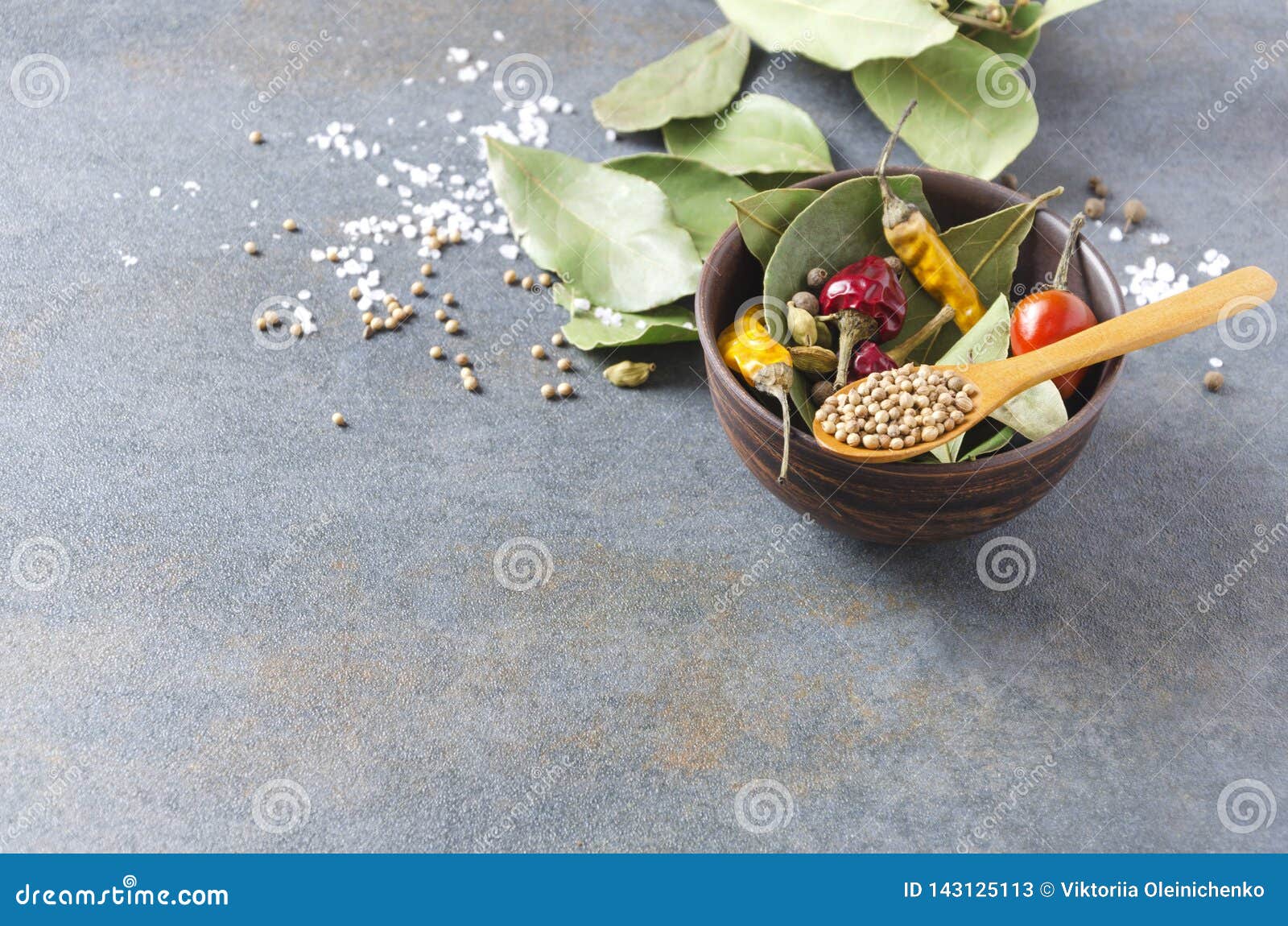Dry Spieces and Herbs in the Mixing Bowl, Spoon Fill of Coriander on
