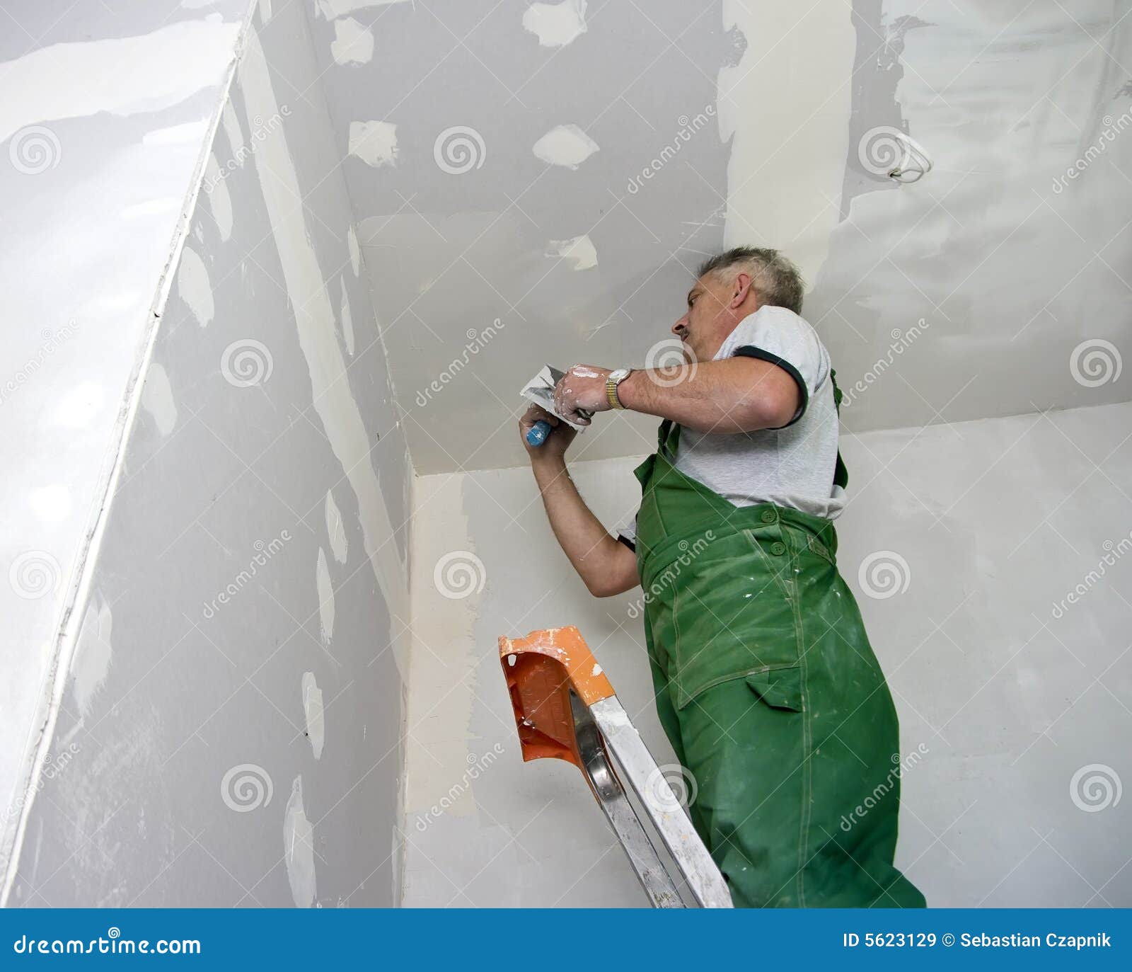 Dry waller at work stock image. Image of gray, improving 5623129