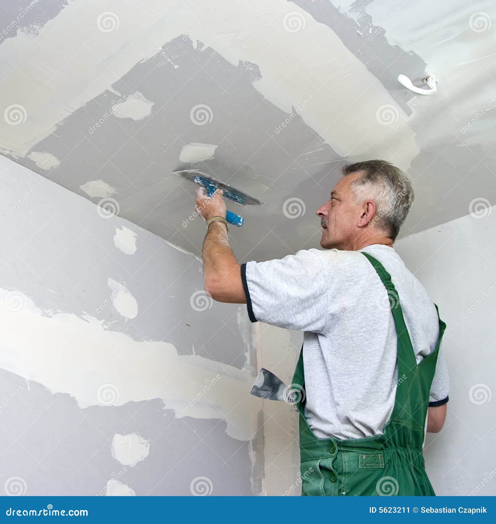 Dry waller at work stock image. Image of interior, improving 5623211