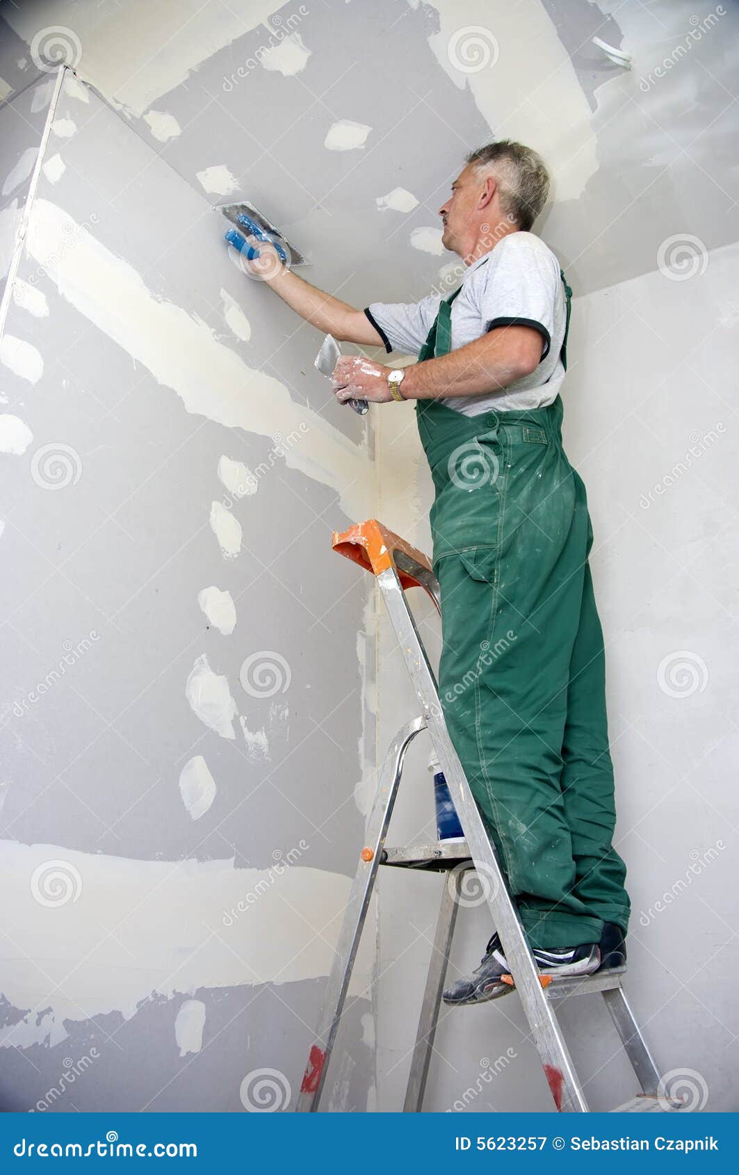Dry waller at work stock image. Image of constructing 5623257