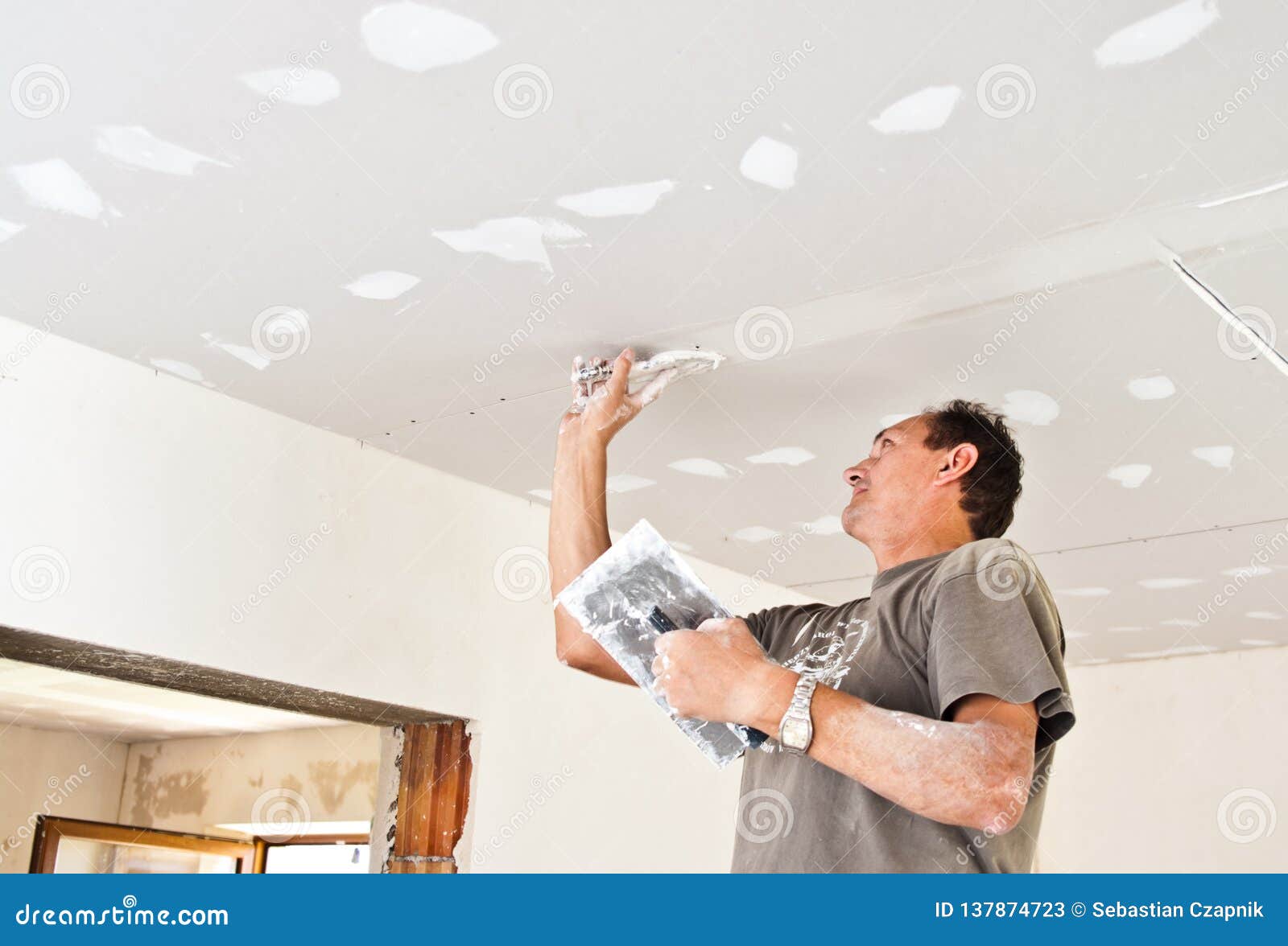 Dry Waller Working At The Ceiling Stock Image Image Of House