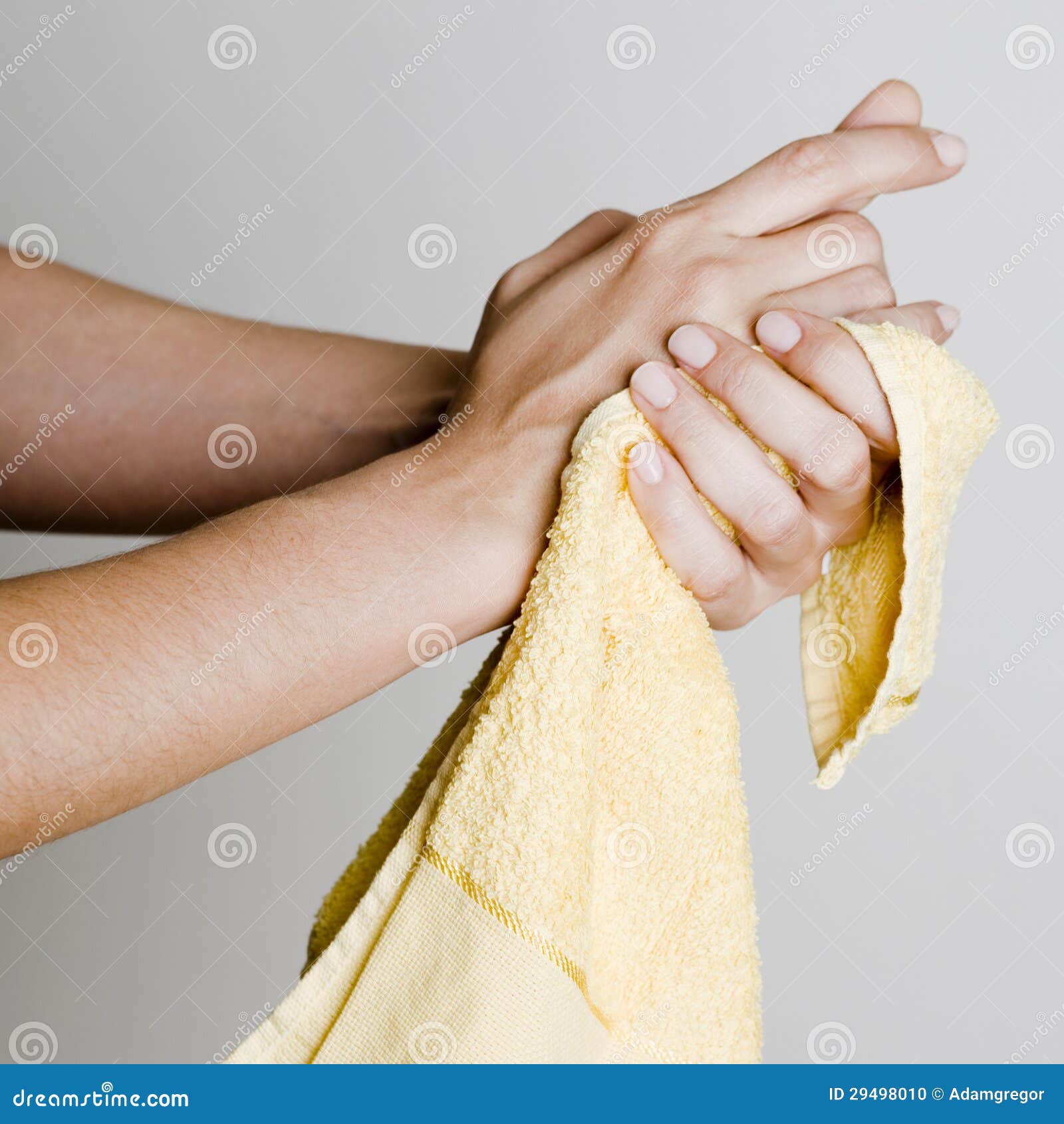drying hands with a towel