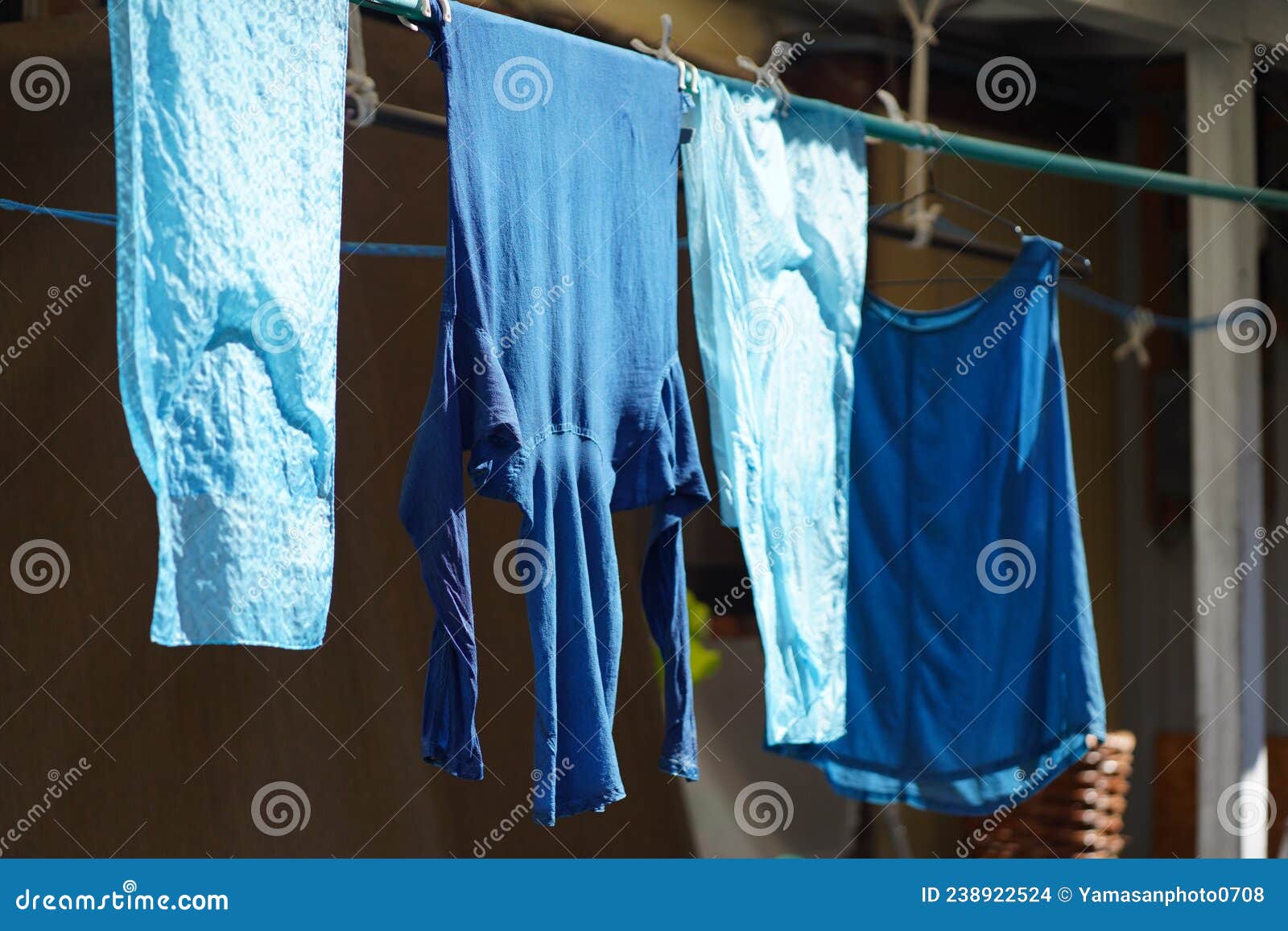 Drying indigodyed clothes stock photo. Image of purple 238922524