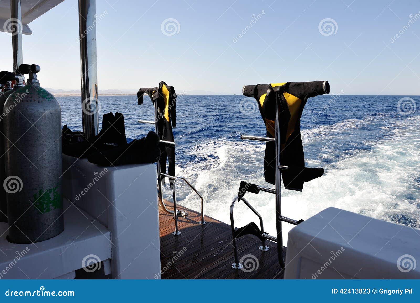 Drying of wet diving suits editorial stock photo. Image of diving 42413823
